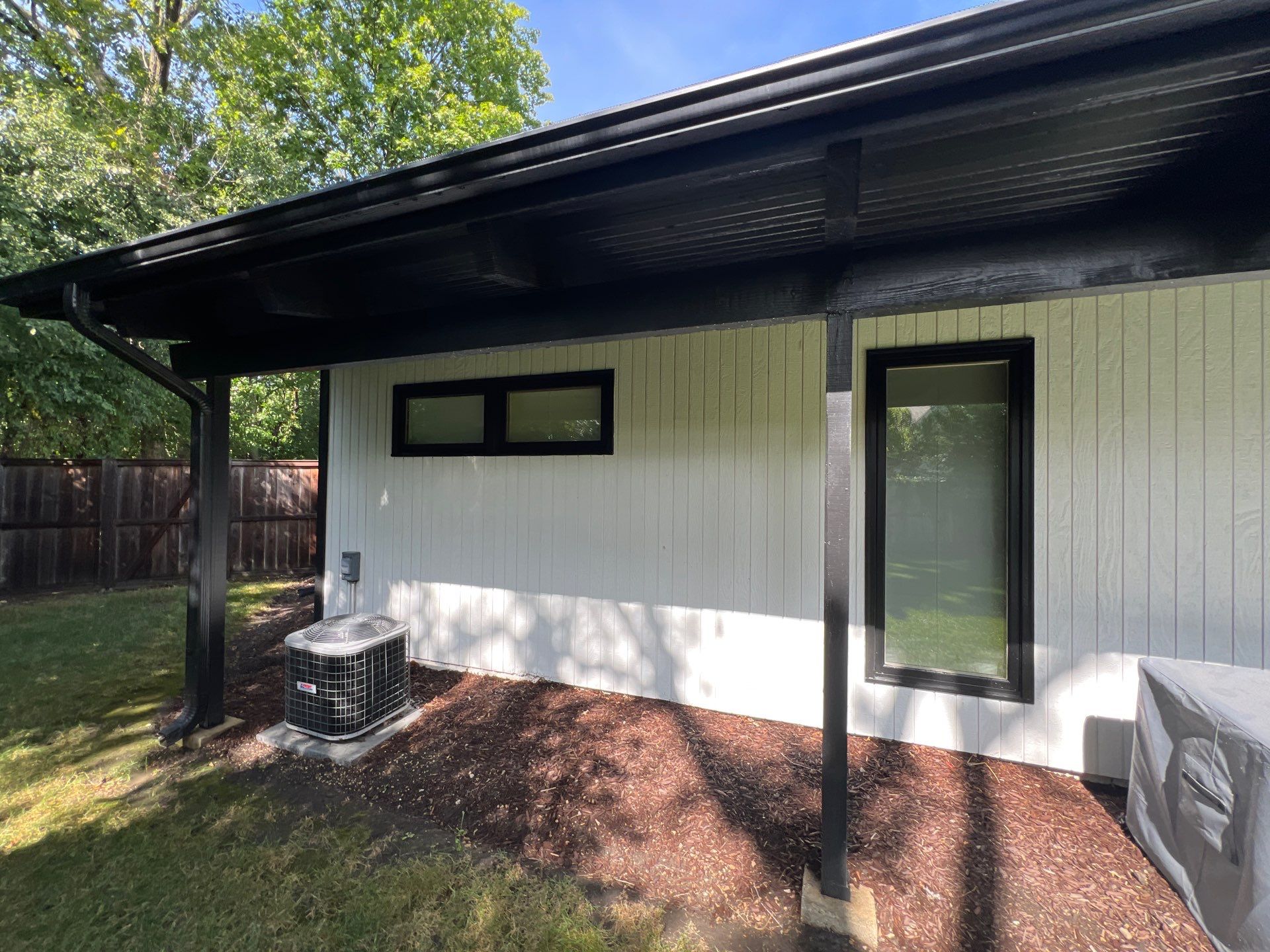 Complete Exterior House, Bluestone & Garage Floor Cleaning by Northern Power Washing LLC.