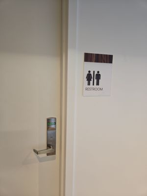 Interior ADA Restroom Signage with Wood Grain Accents