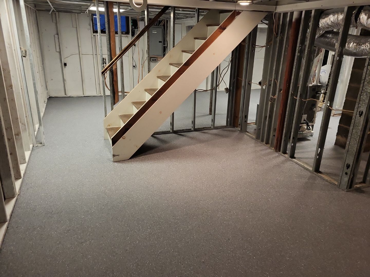 Basement Concrete Floor Coating with Penntek Flake System by Spectrum Painting, LLC