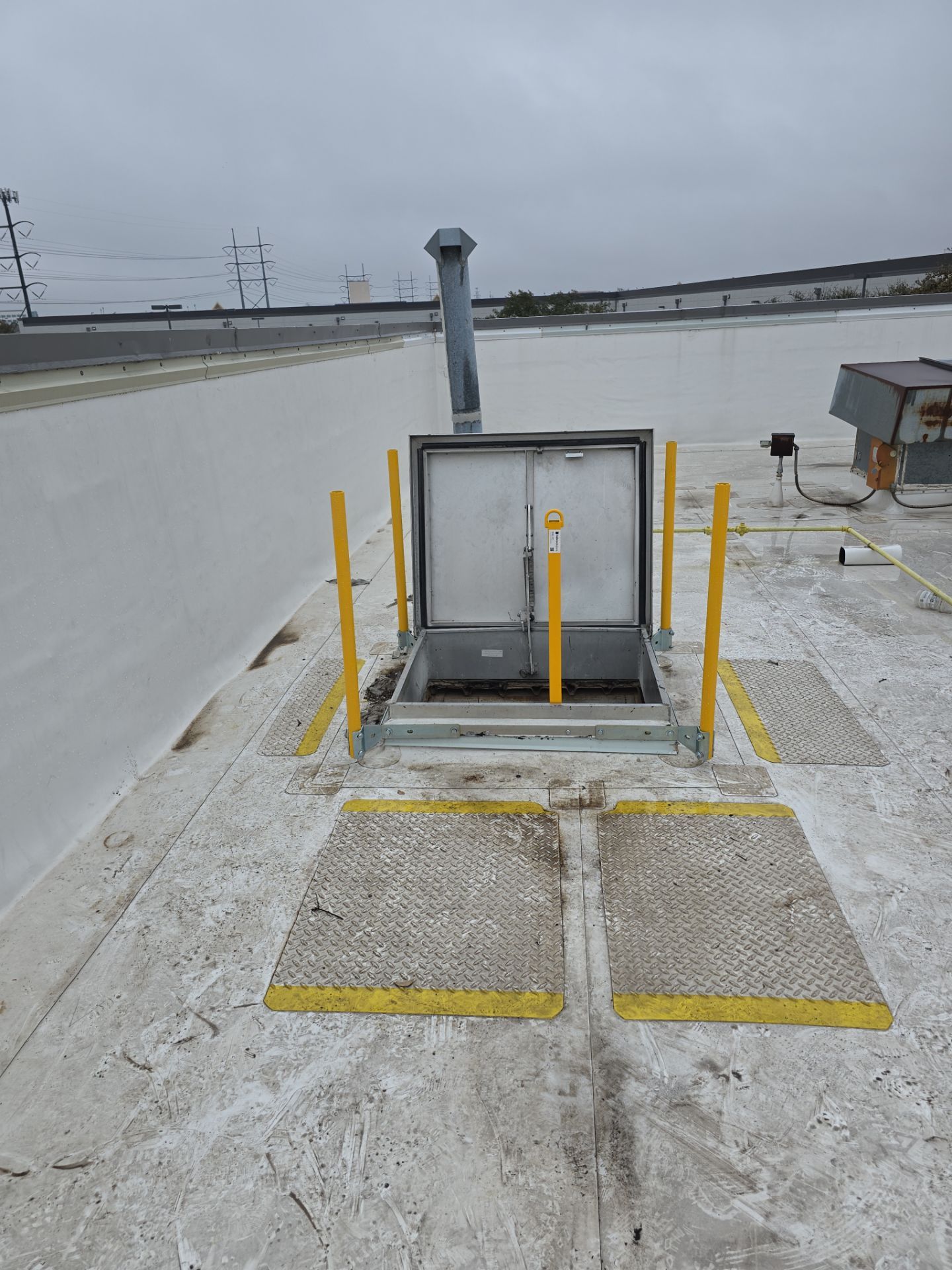 Commercial Roof Hatch Safety Rail using Bilco Safety Rail by Roof Experts