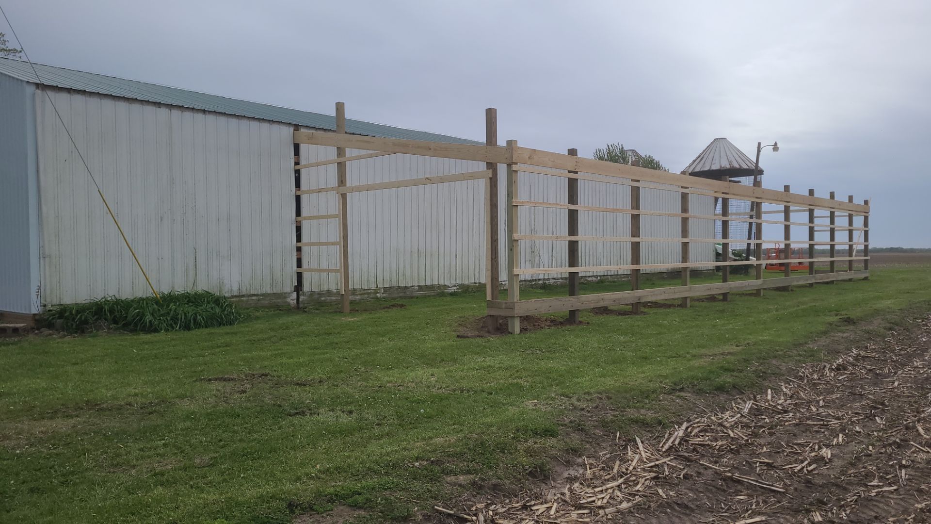 Reskin pole barn and add lean-to by Dagny Builders
