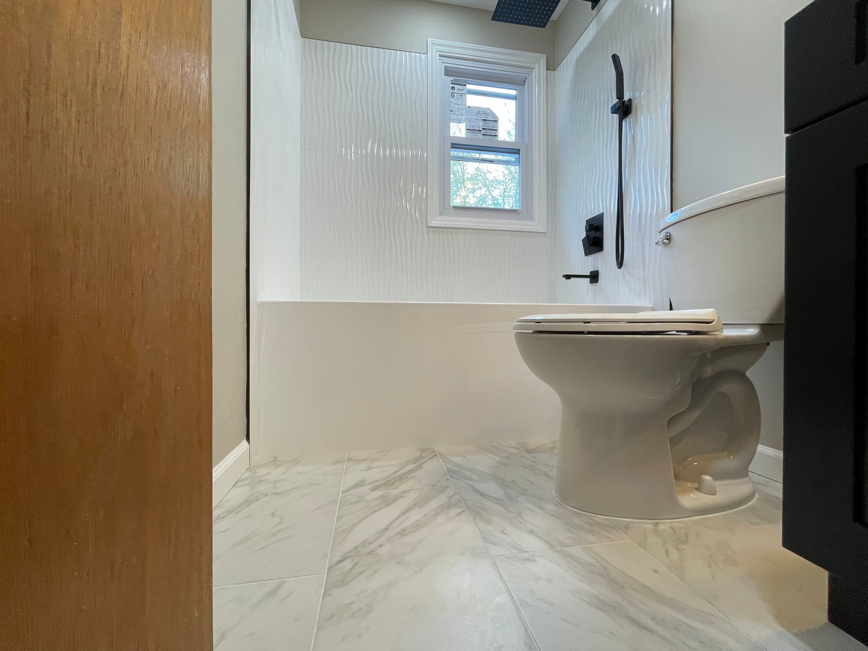 Bathroom Remodel using Tile by Home Concepts Construction