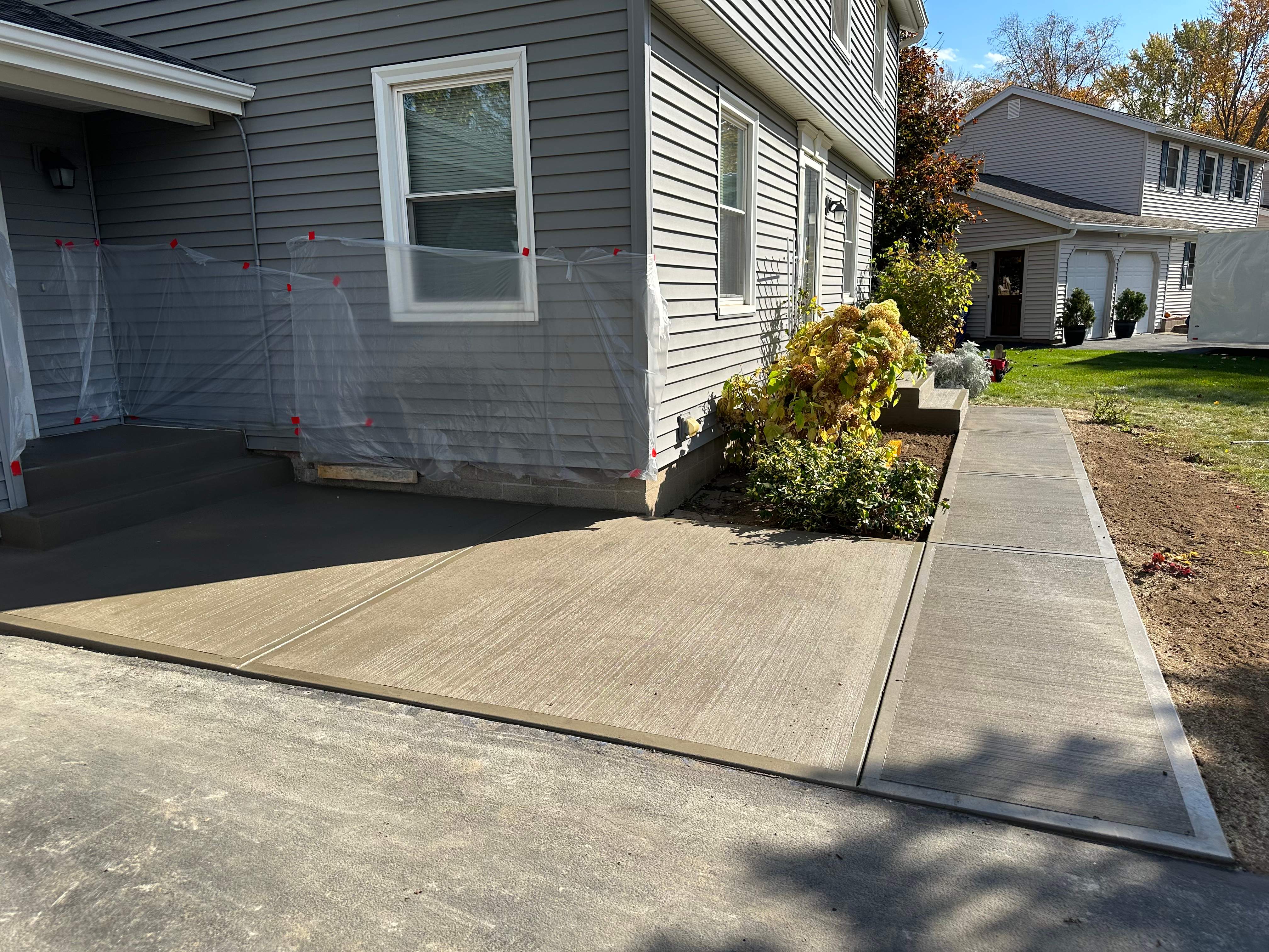 Broom Finish Walkway and Porch  by NG Masonry & Construction LLC