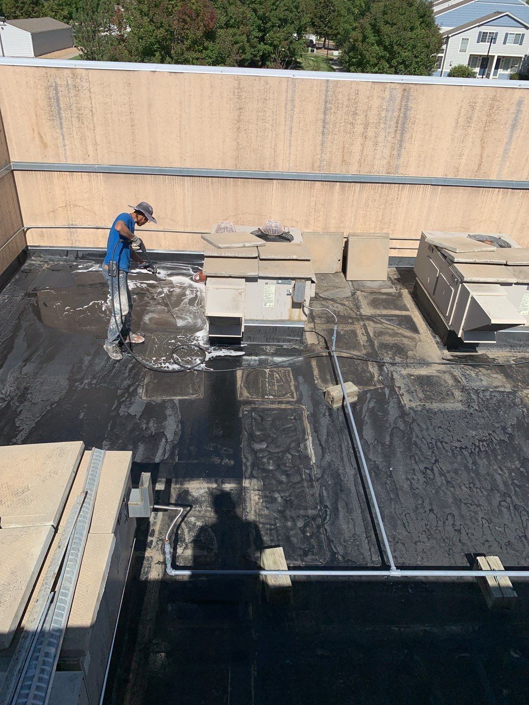 Commercial Roofing Installation using American Standard Coating - S  by A to Z Roofing
