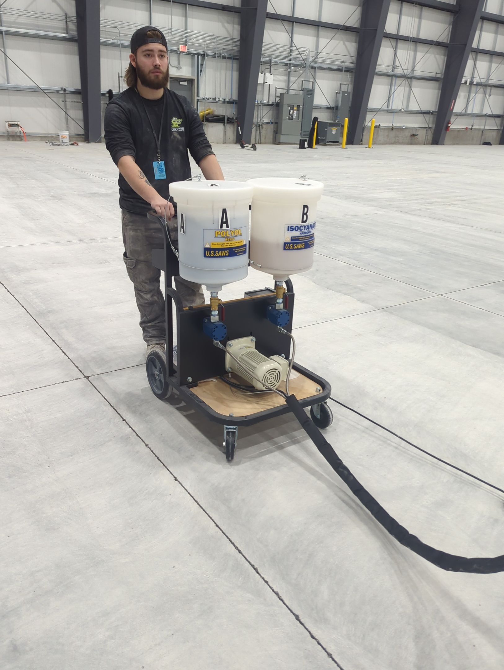 Airplane Hanger using Light Grey Commercial Penntek Epoxy by Croc Coatings, LLC