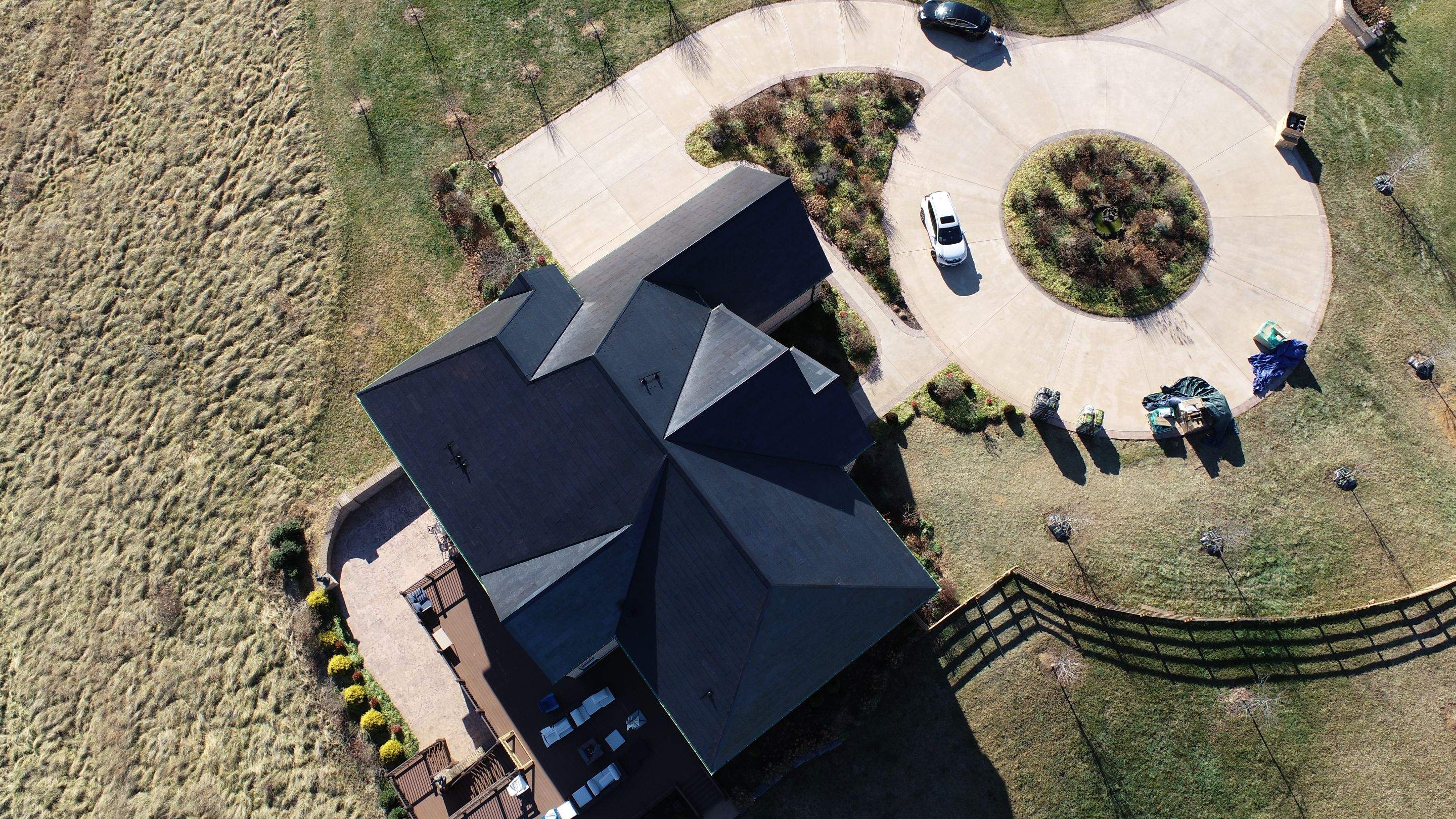 Tesla Solar Roof Replacement by American Home Contractors
