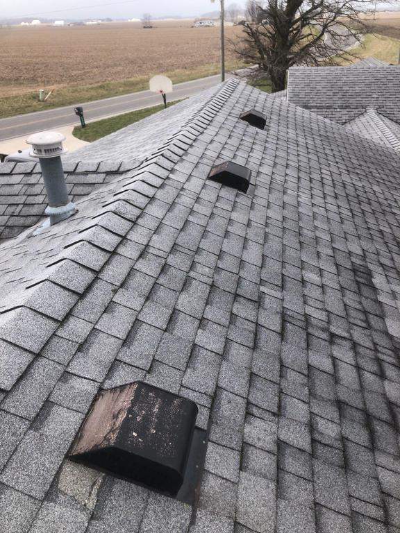 Storm damage roof replacement by Nitro Roofing and Construction