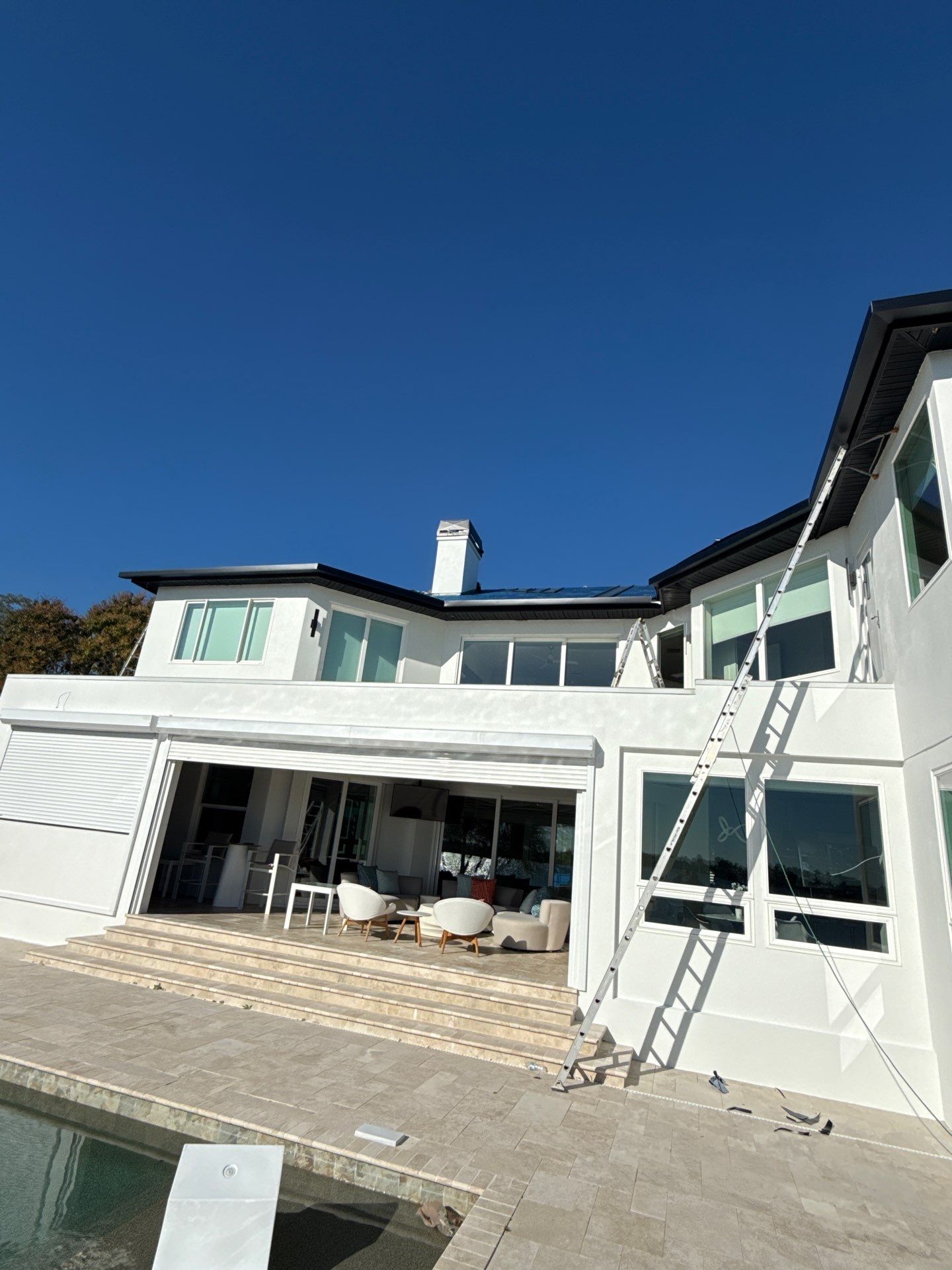 Soffit and Fascia Installation and black seamless gutters in Sarasota FL by Gutter Professors
