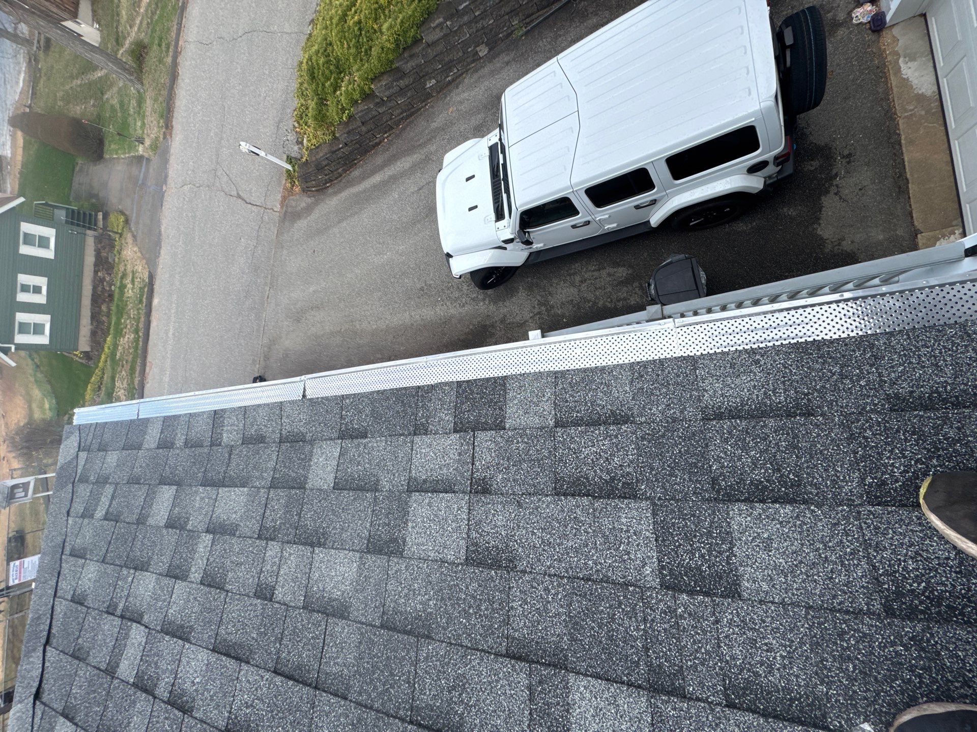 Estate Gray Shingles by Reimagine Roofing