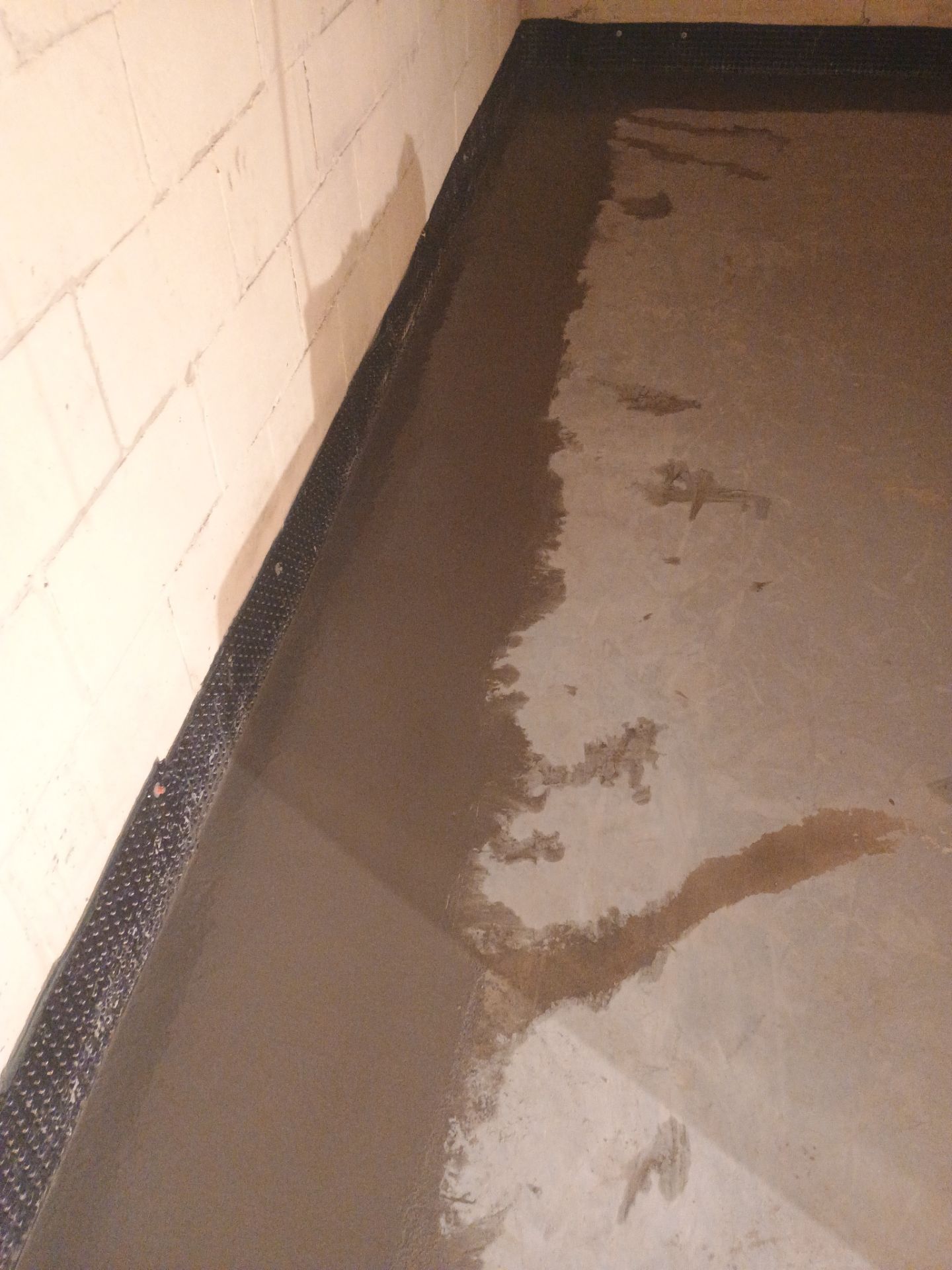 Drain Tile & Sump Pump for Kassie's Rental Property by Waterproofing Northeast