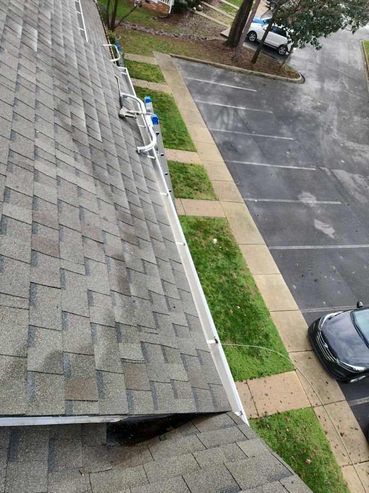 Gutter Cleaning using water by Power Wash Masters LLC