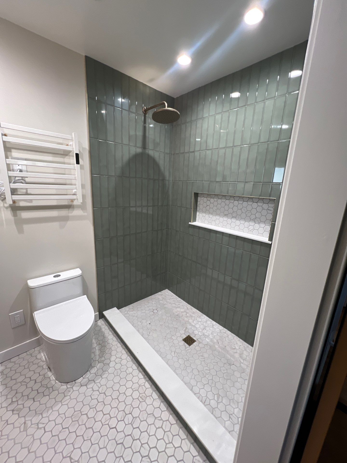 Custom Bathroom Remodel with Heated Floors and Vertical Sage Tile by  H4H Remodeling and Repairs Inc.