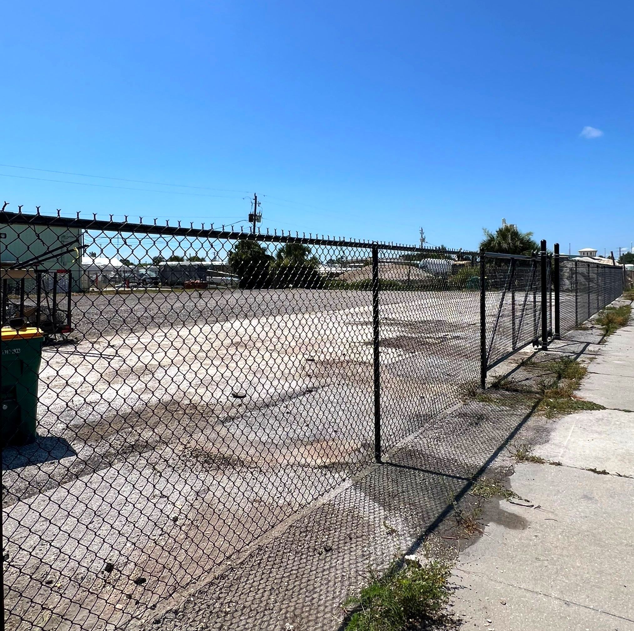 Chain-link Fence Installation using 6ft Black Chain Link Fence  by Asap fence and gates, LLC
