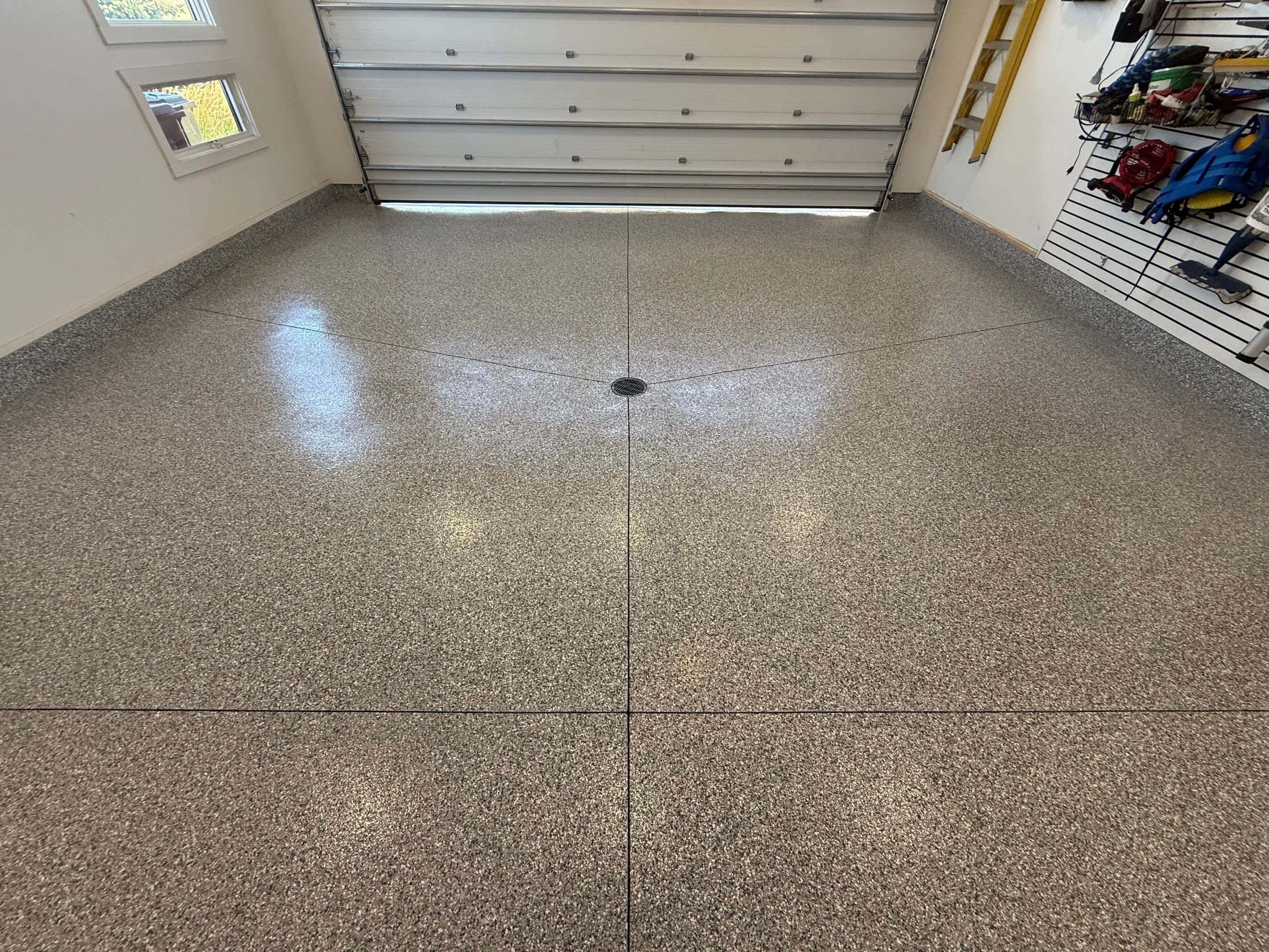 Gravel Flake Garage Floor Coating in Yankton by Select Painting, Coatings & Garage Cabinets