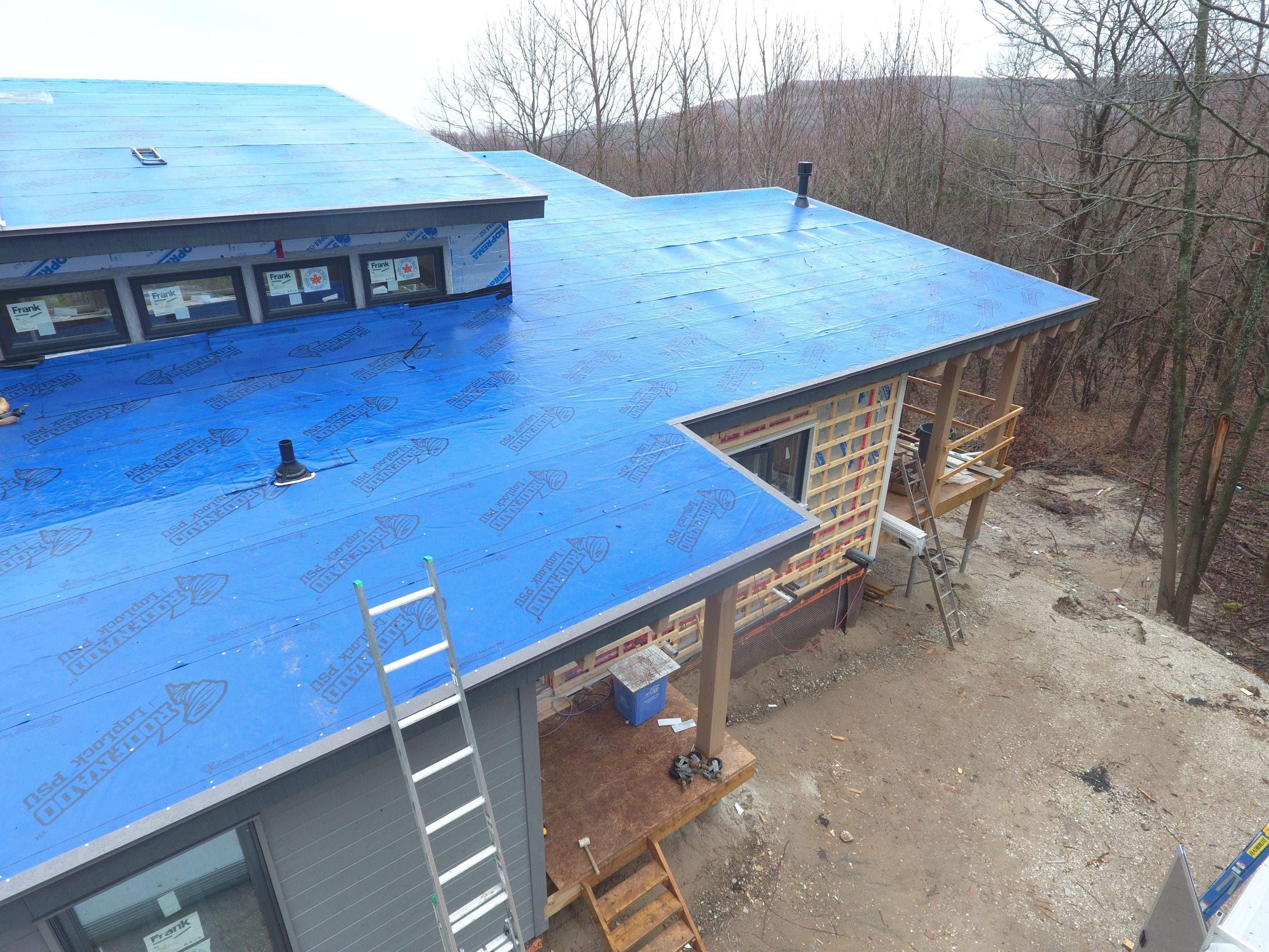 Residential Roofing Installation using 24 Ga Standing Seam Metal by Jay Carter Roofing & Sheet Metal