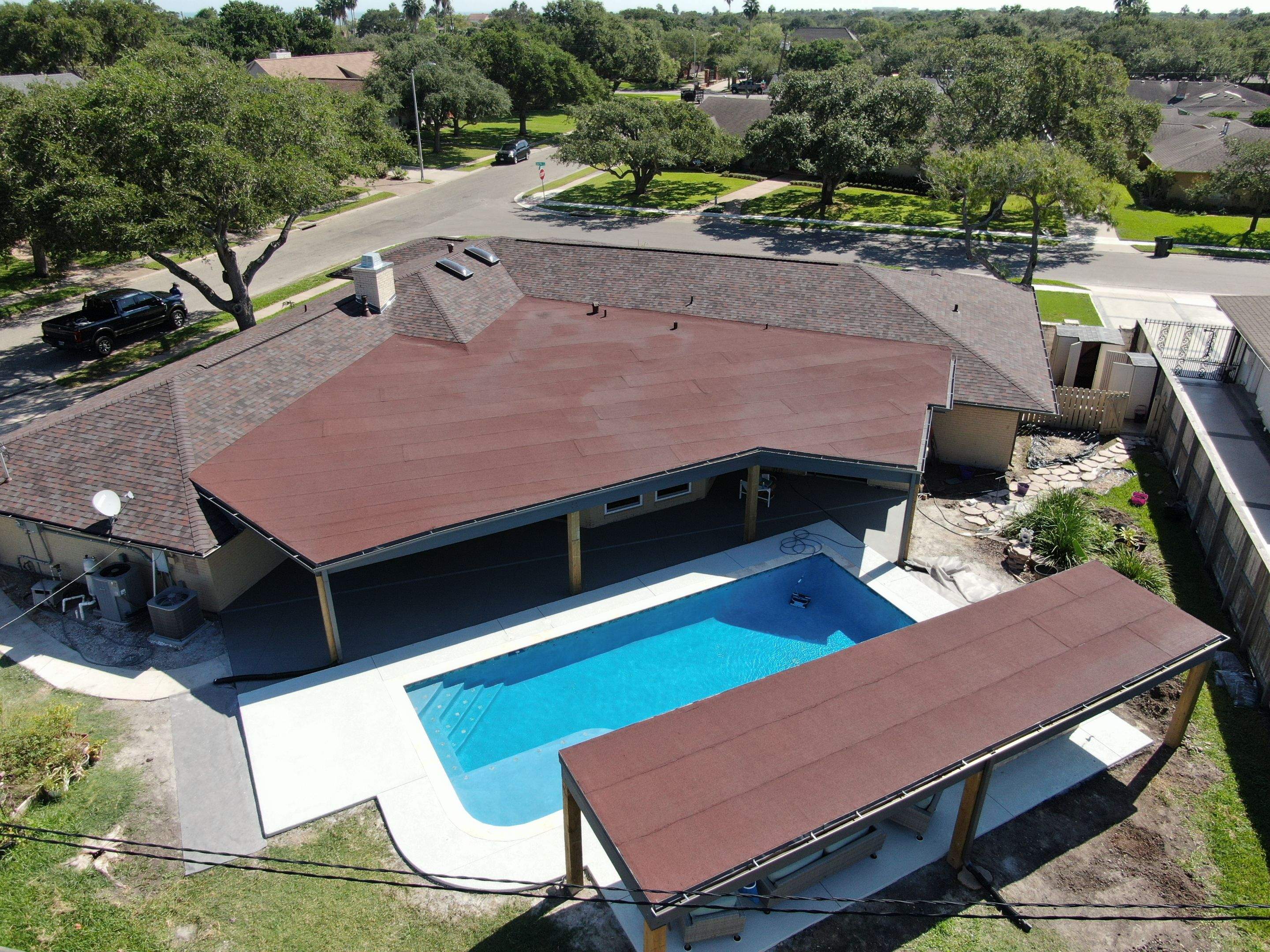Beautiful pool side build by Bayfront Roofing and Construction