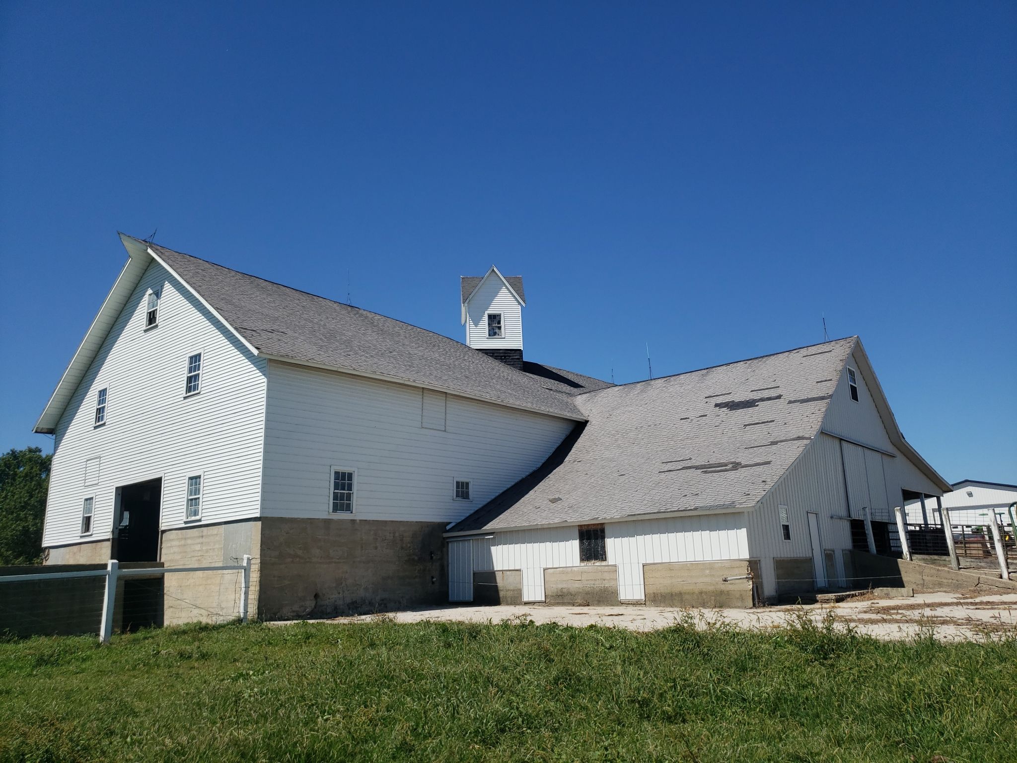 New metal roof on heirloom barn by Dagny Builders