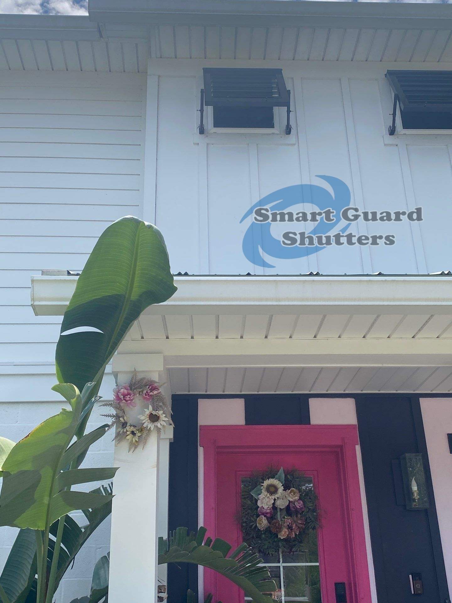 Impact Bahama Shutters in Jet Black by Smart Guard Shutters
