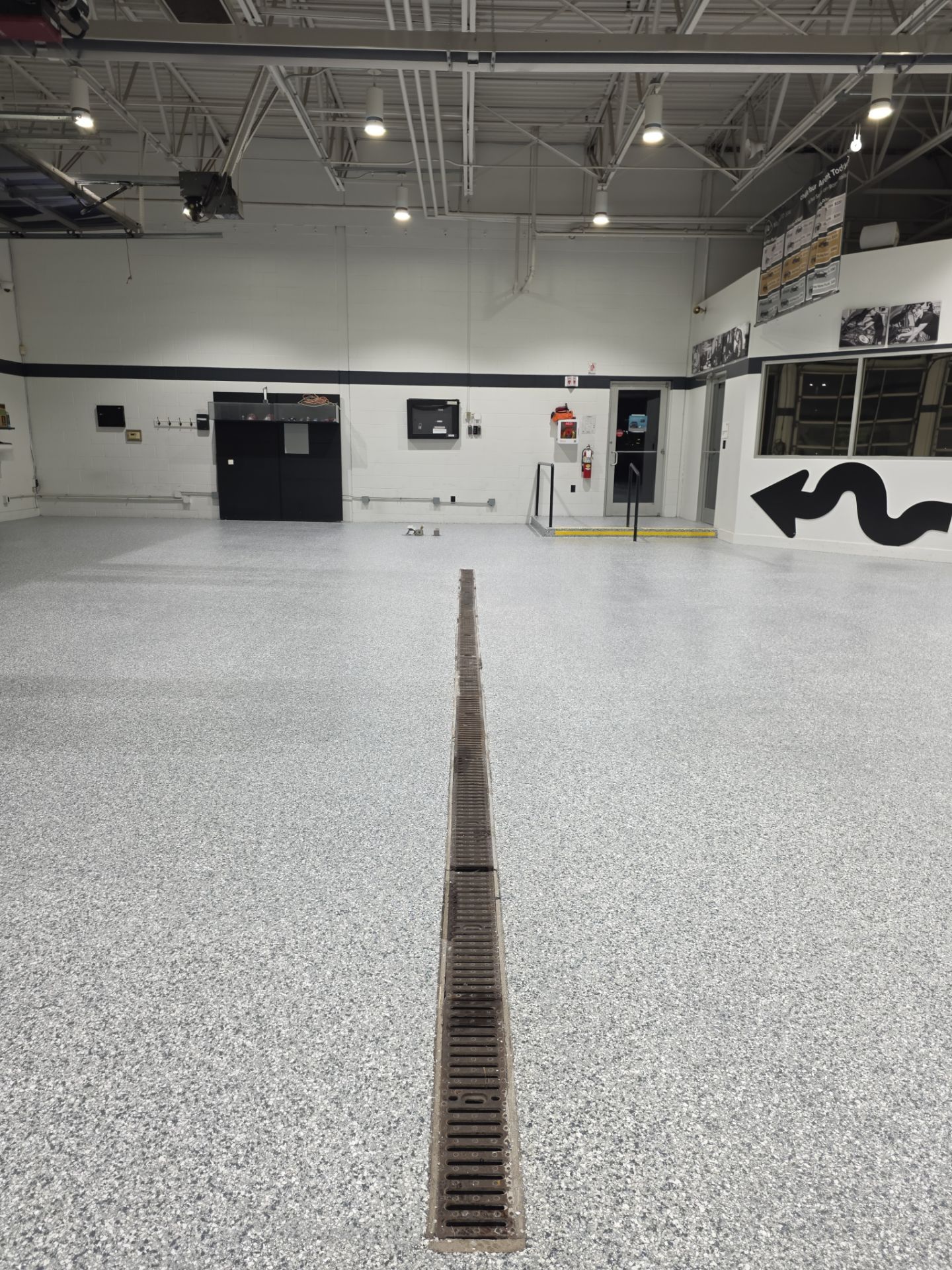 Mini Cooper Commercial Epoxy Floor Installation by Revival Concrete Coatings