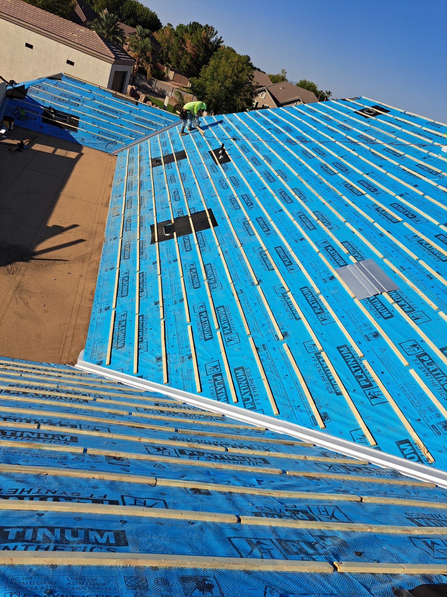 Gray Tile by Reimagine Roofing