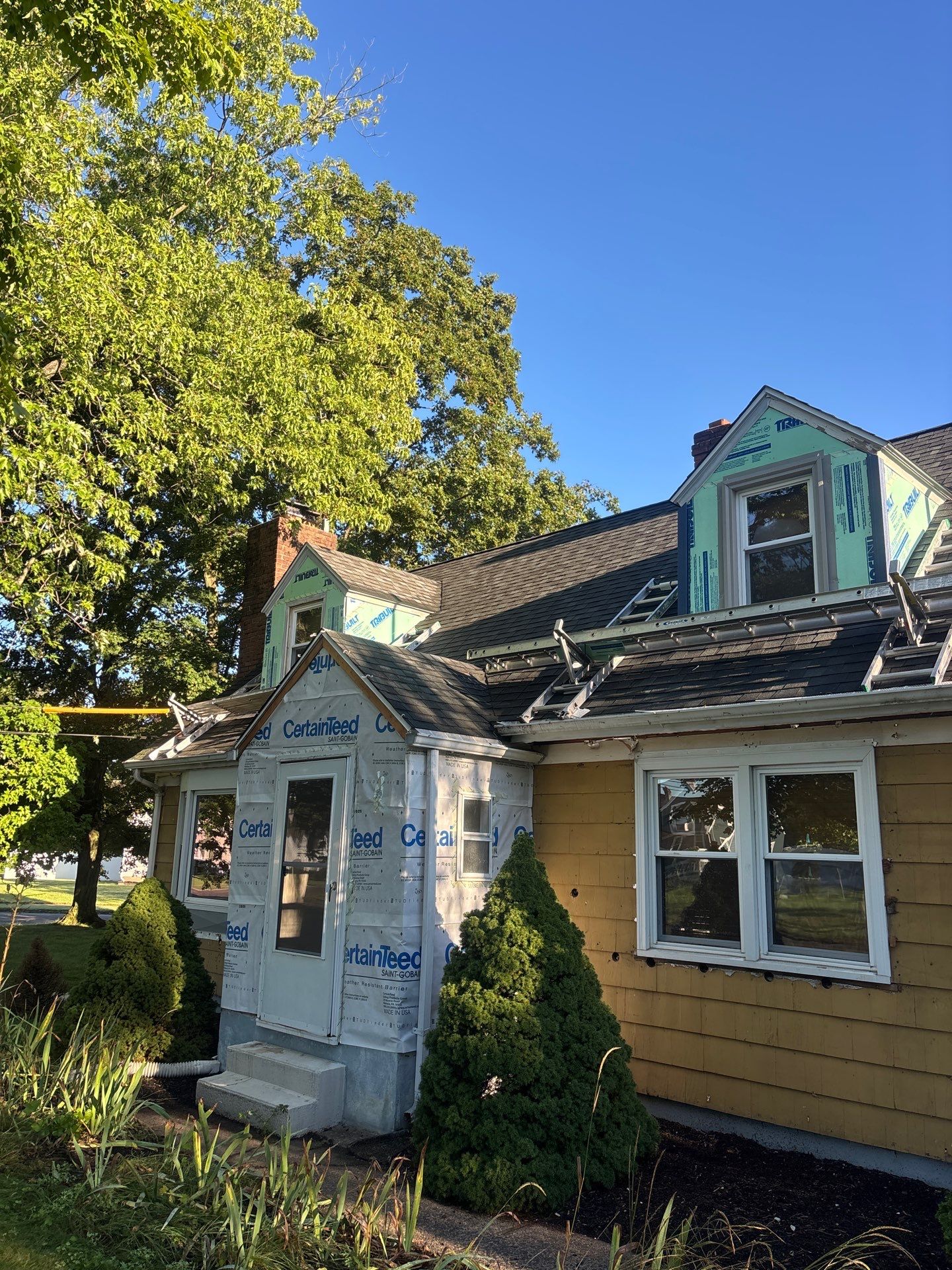 Siding Renewal Using CertainTeed Monogram D/4 Clapboard in Midnight Blue by DiGiorgi Roofing and Siding Inc