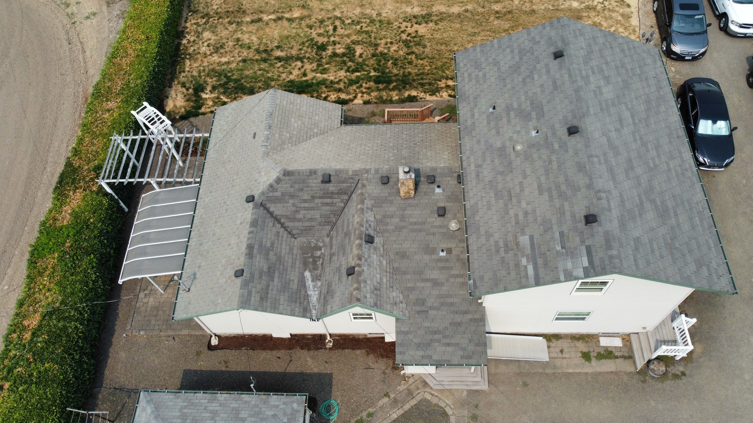 Residential Roofing Installation using IKO Dynasty (Color: Granite Black) by Orezona Building & Roofing Company, Inc.