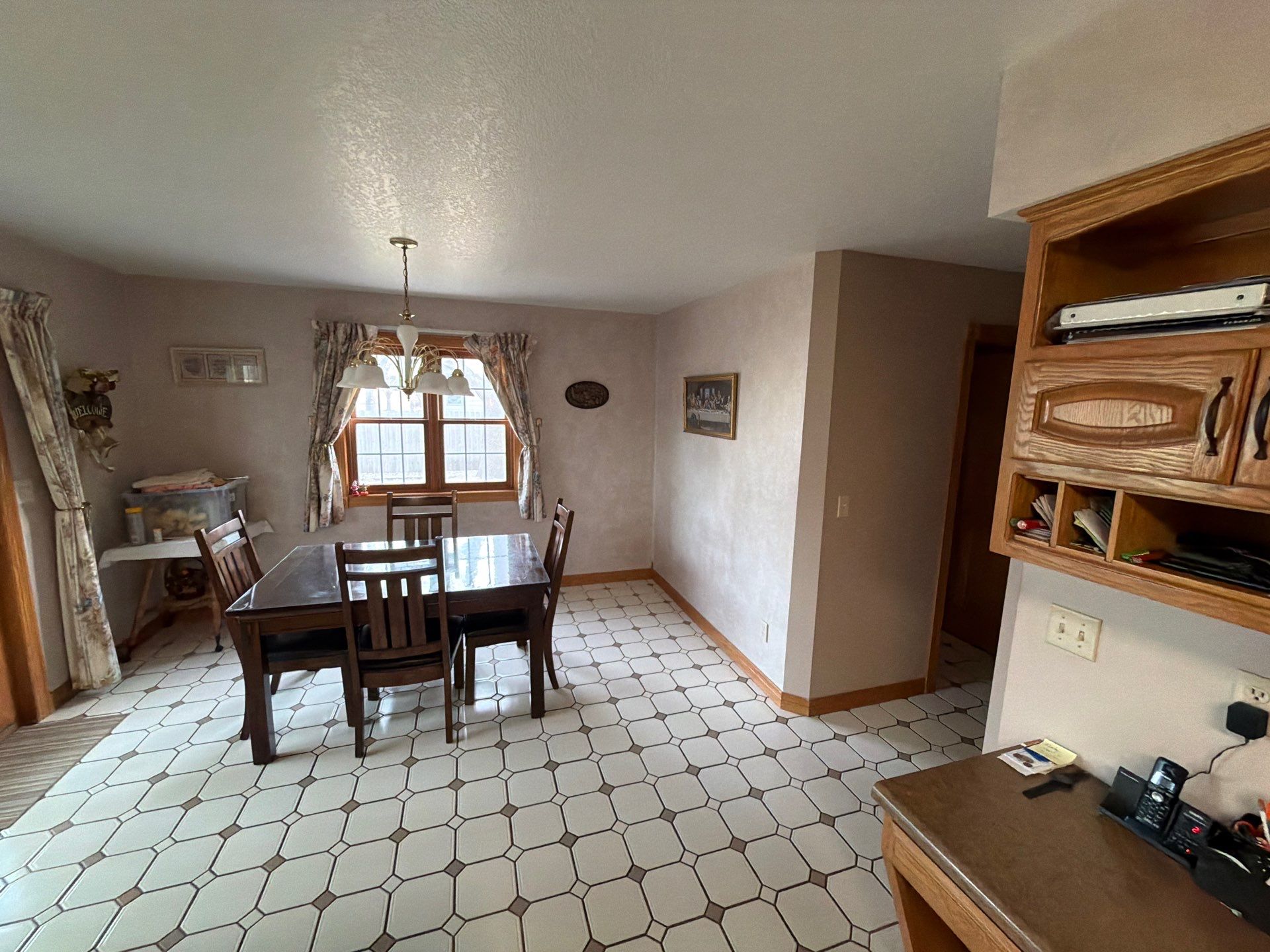 Kitchen Cabinet Painting and Hardware Update in Sioux Falls by Select Painting, Coatings & Garage Cabinets