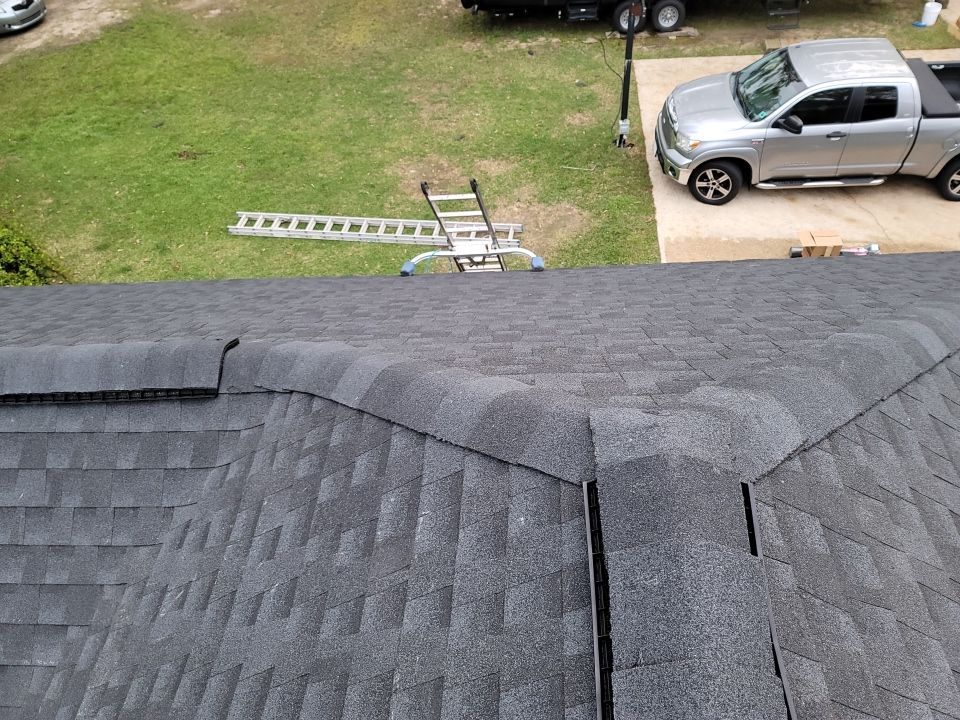 Residential Roofing Installation using Roof Replacement by American Roofing & Construction LLC