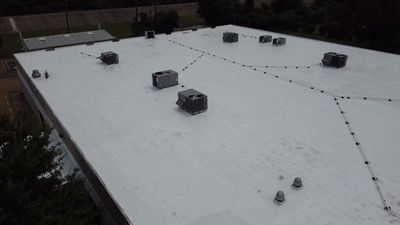 Flat Roof Coating Installation