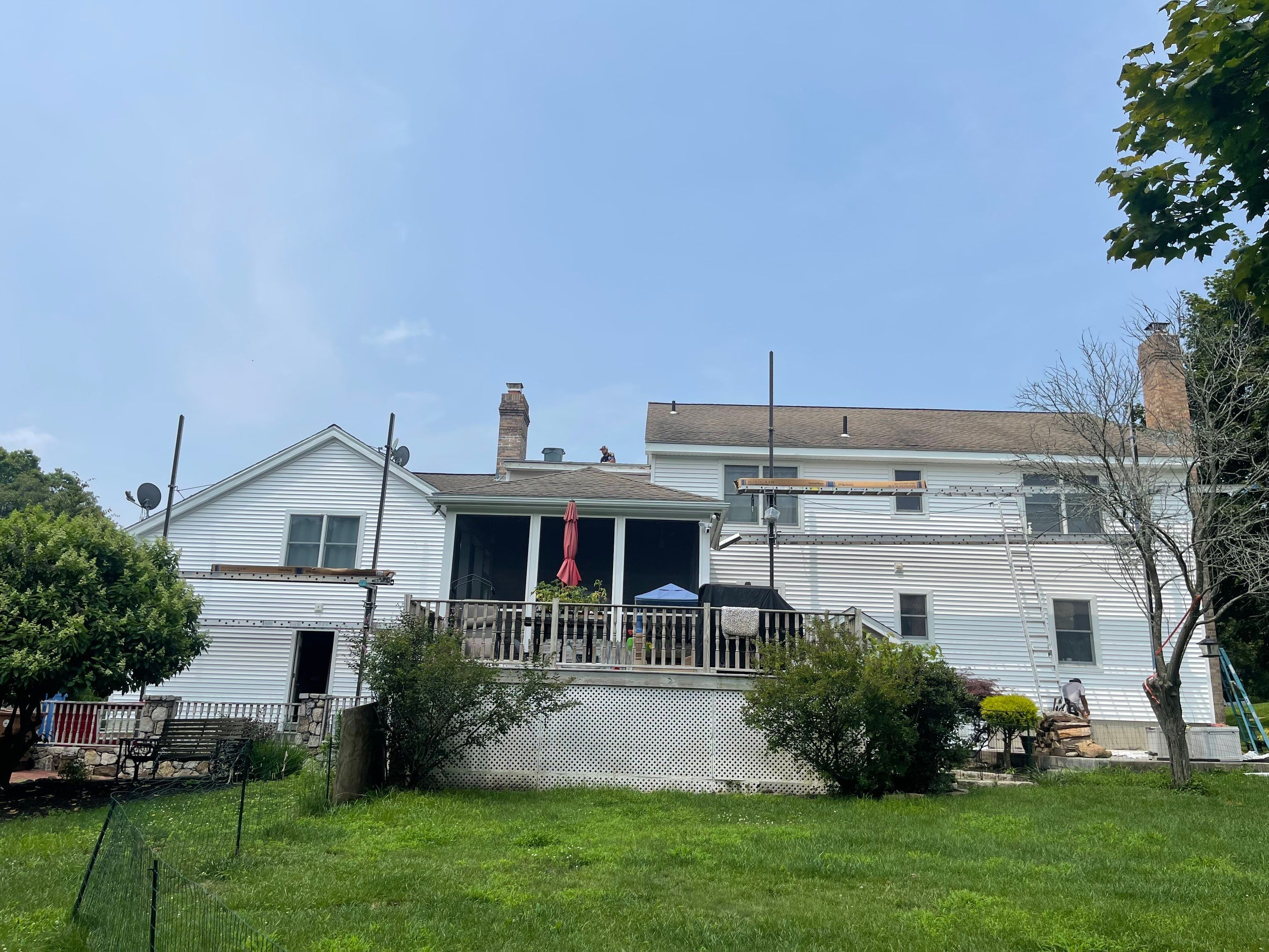 Siding Installation using Mainstreet Colonial & White gutters by A Plus Exterior