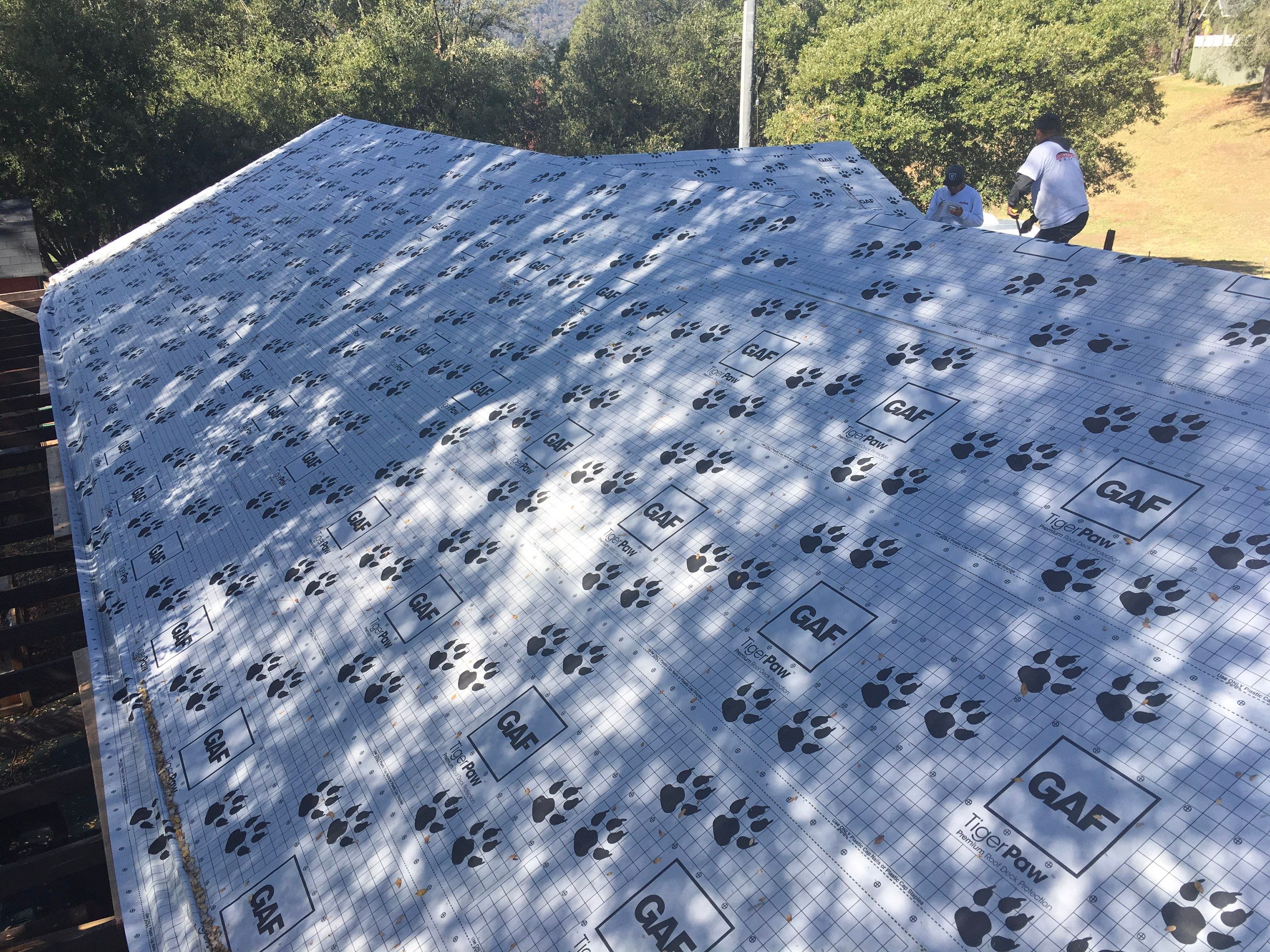 Metal roofing installation using Standing seam metal roofing system by Straight Edge Roofing Inc