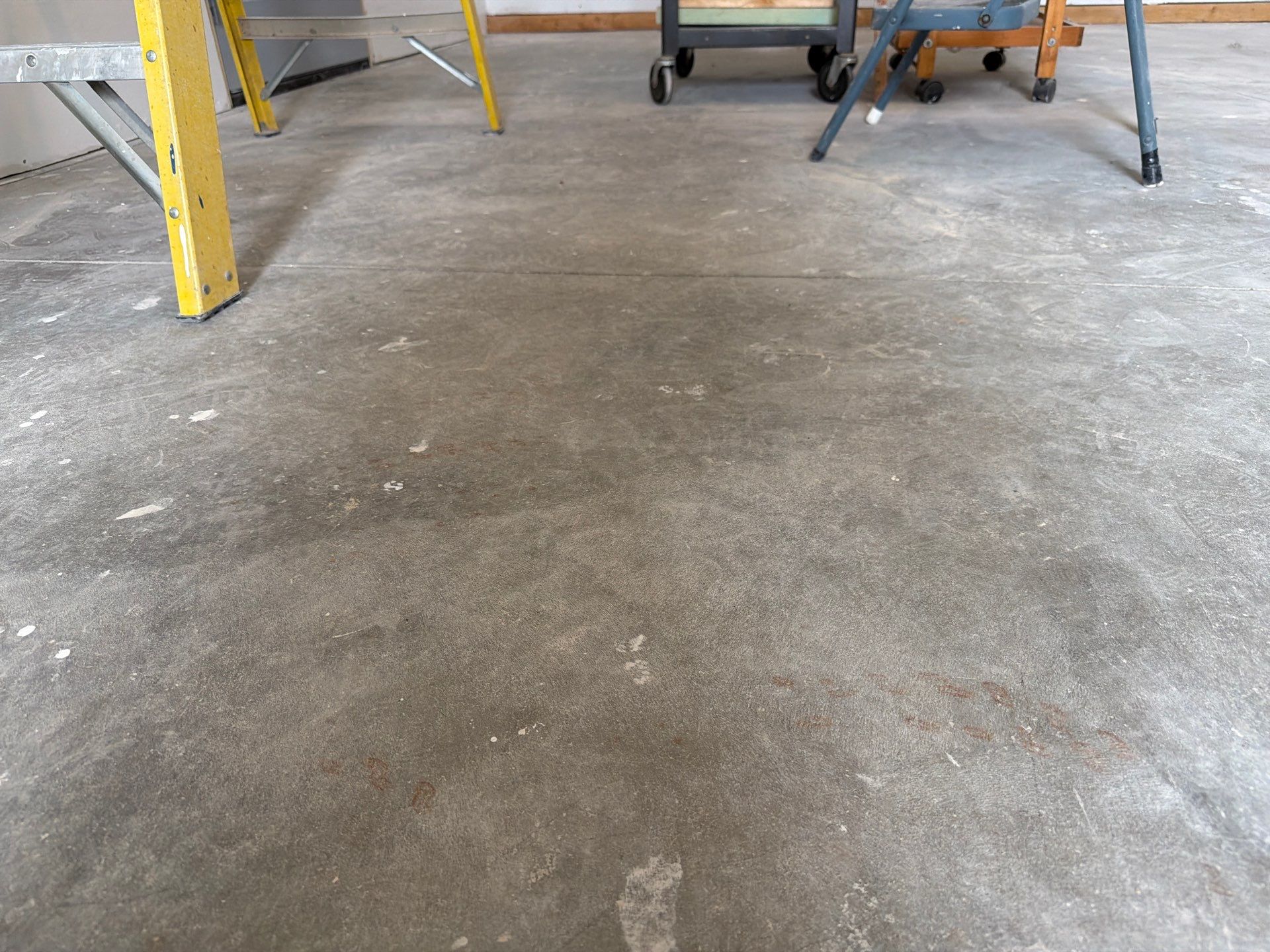 Decorative Chip Concrete Coating Installation in Luverne by Select Painting, Coatings & Garage Cabinets