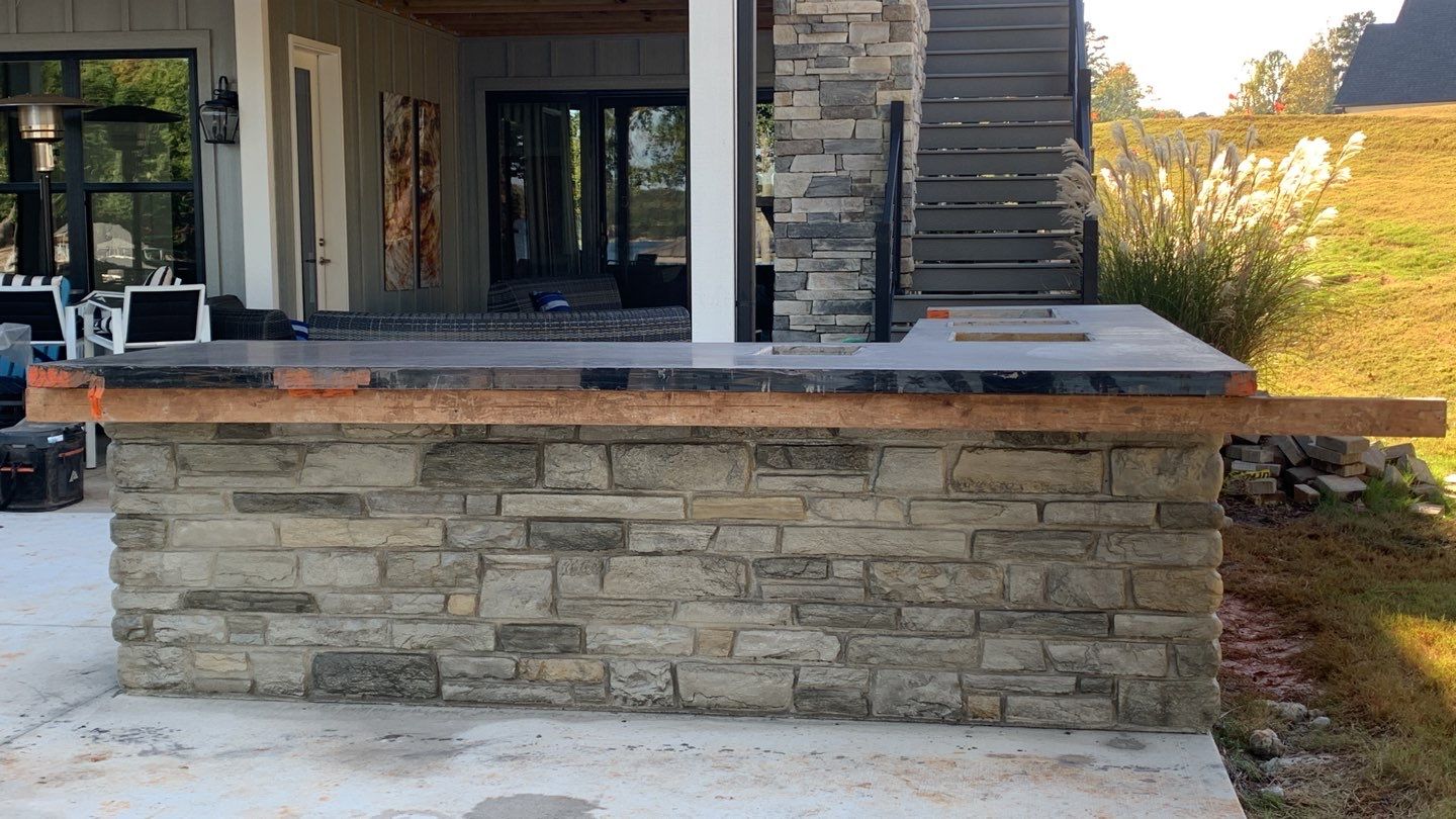Outdoor Kitchen on Lake Keowee by Xtreme Concrete Services