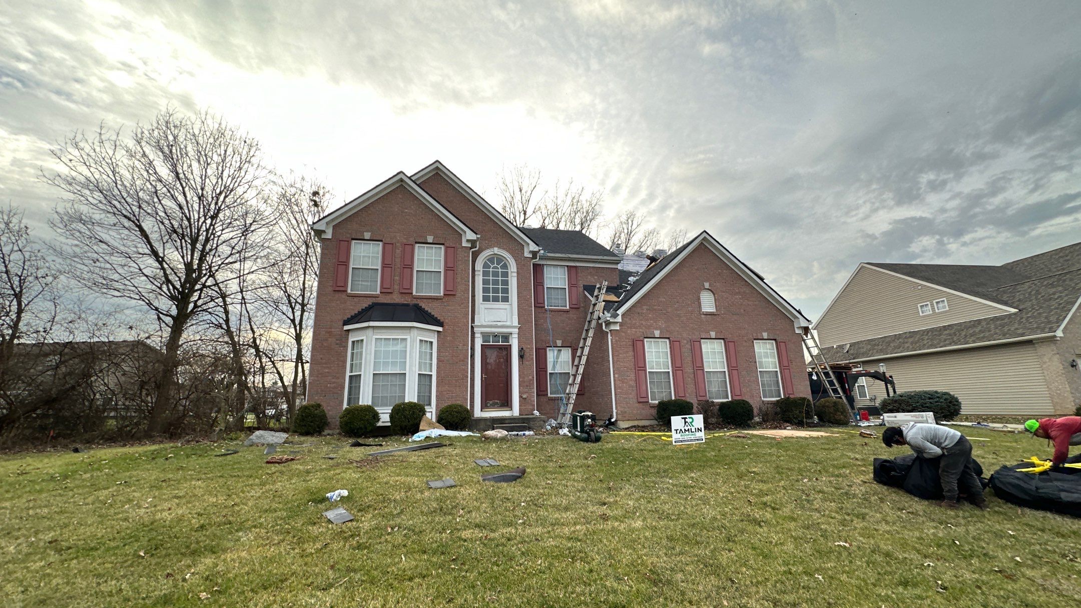 Walden Ponds - Pristine Black and Hydro Flo Gutter Guards by Tamlin Roofing