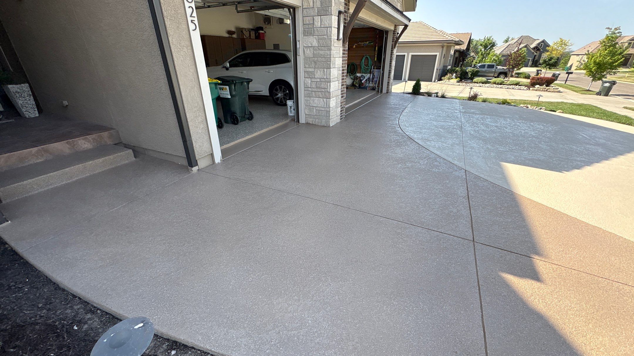 Two-Tone Driveway Resurface - Olathe, KS by Big Red Decorative Concrete, LLC
