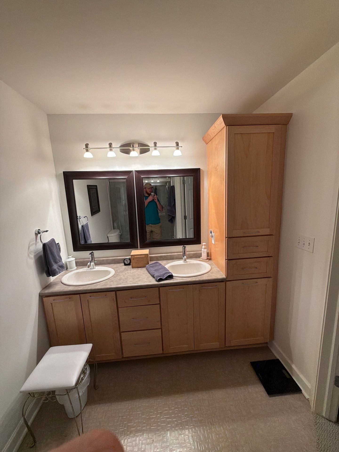 Greenfield Bathroom Remodel Featuring Double Vanity and Marble Tile Shower by OCS Contracting Services
