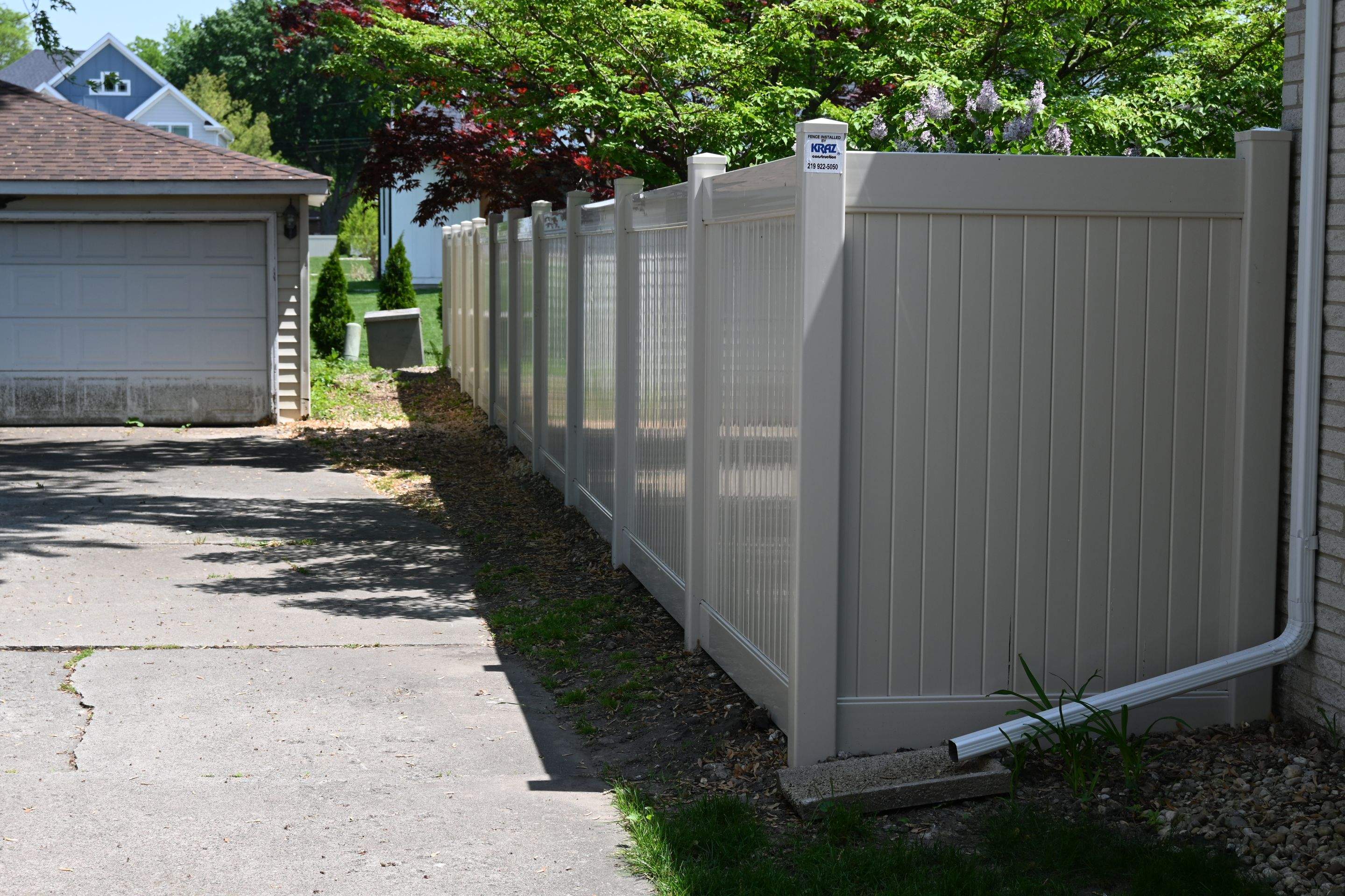 Vinyl Fence Installation in Backyard by Kraz Construction