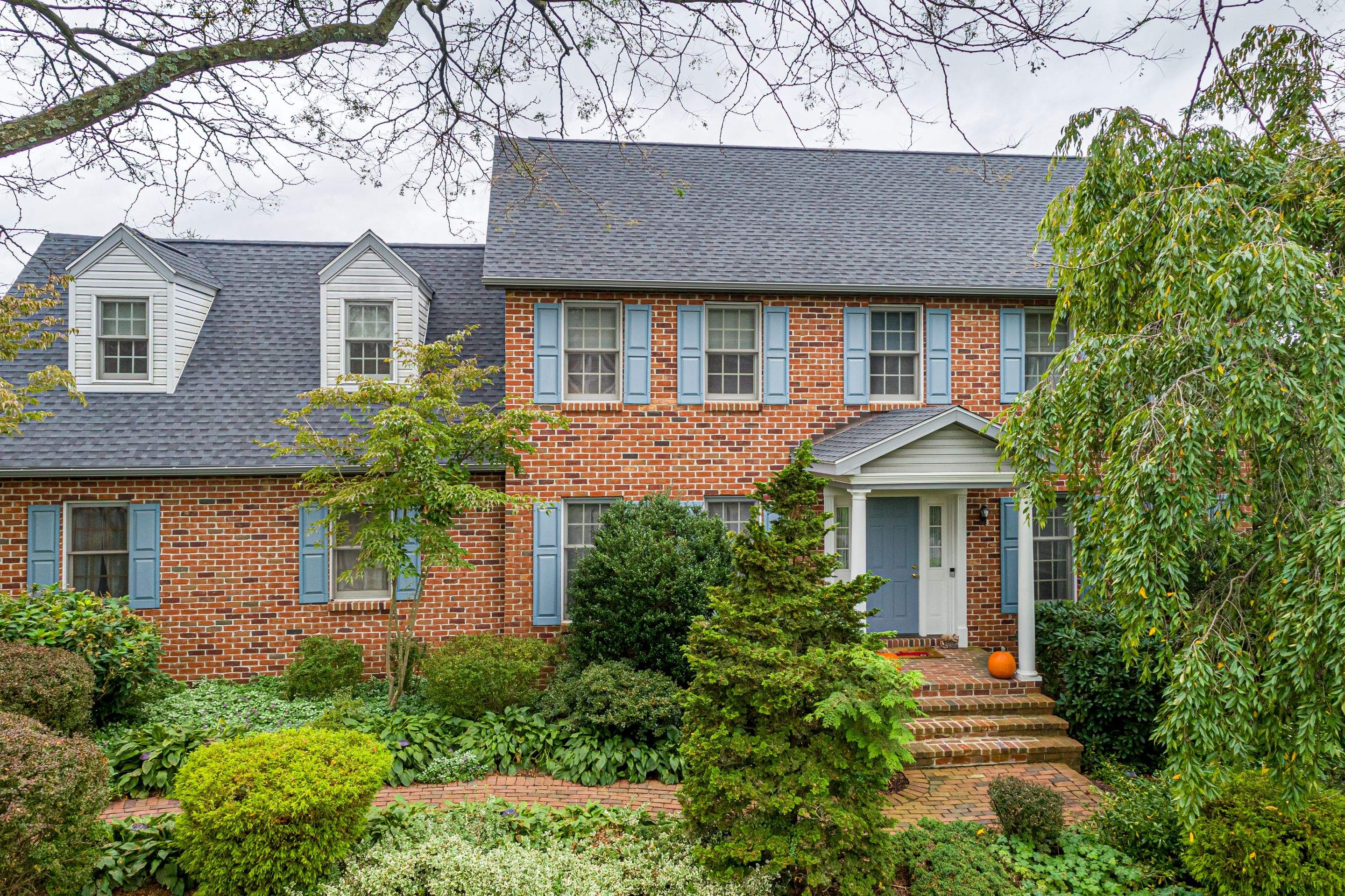 Reshingle-slate by Esh Builders