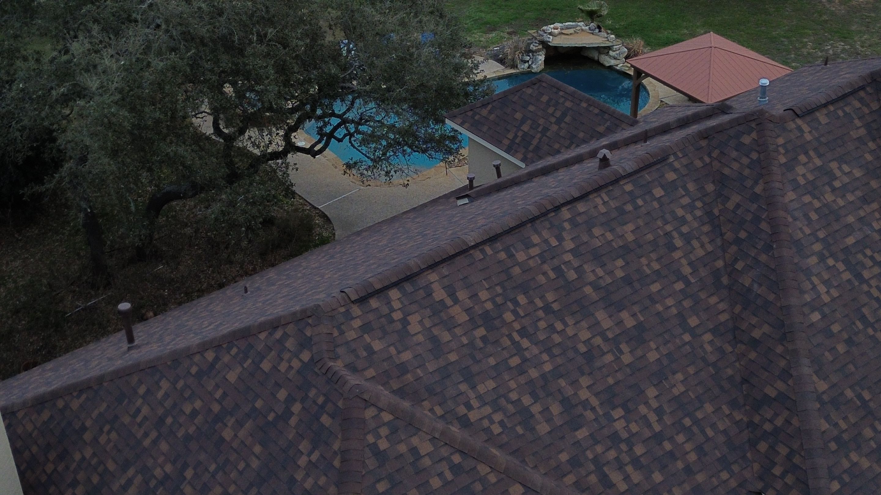 Residential Roof Replacement using 30 Year Laminate Shingles with High Profile Ridge by Premier Roofing and Contracting