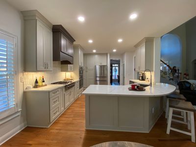 Modern Kitchen Remodeling with Quartz Island and Custom Vent Hood in Woodstock