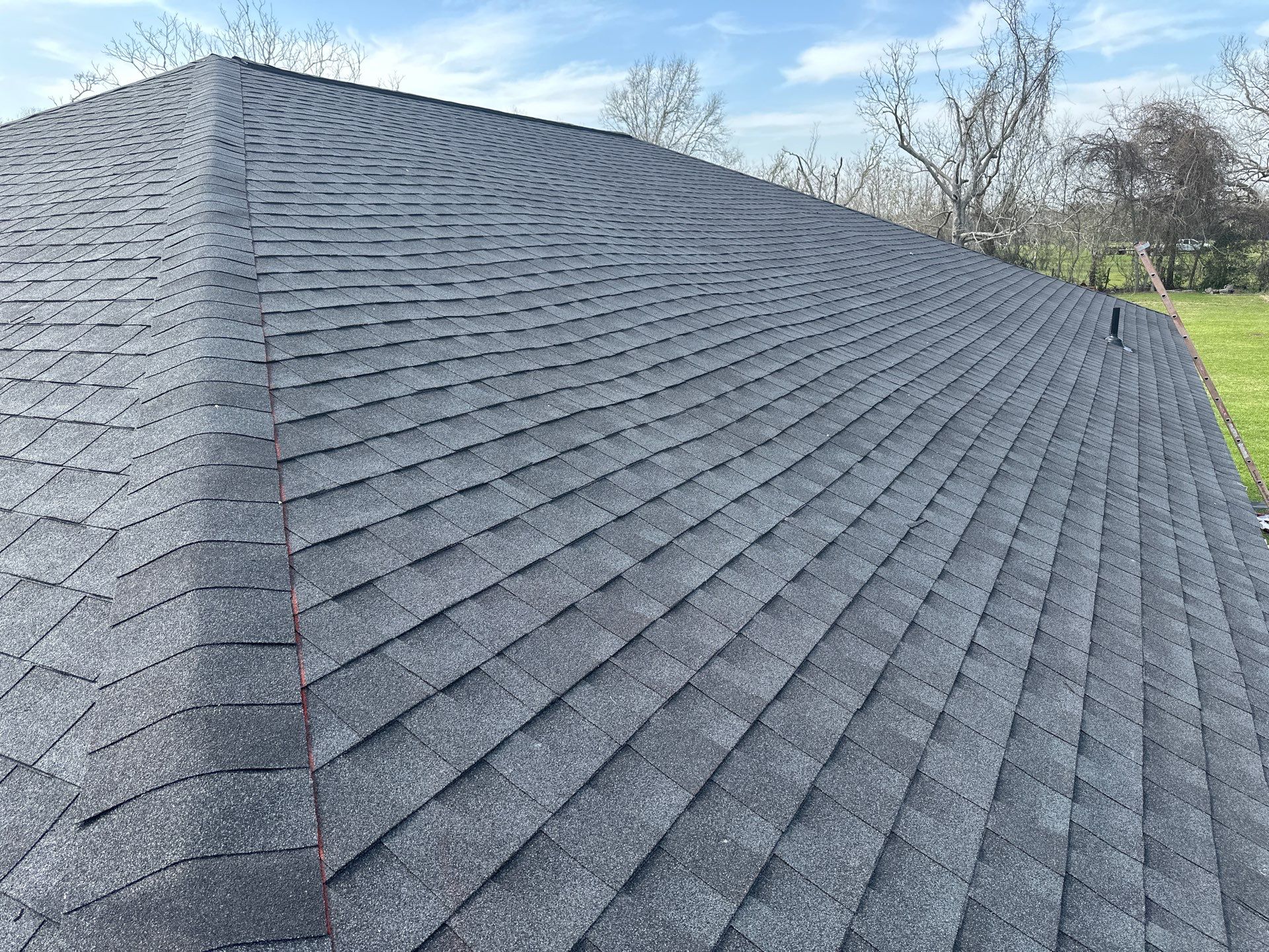Residential Roofing Installation using GAF Timberline Night Shadow (NS) by Motion Roofing