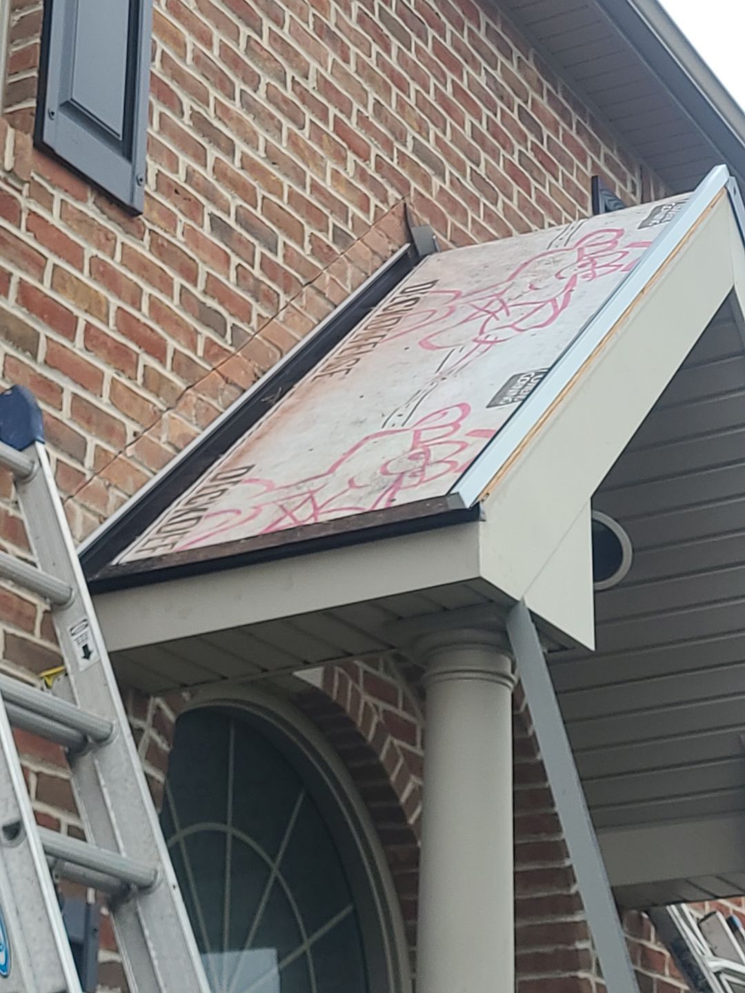 Front Porch Metal Awning Replacement in York PA | Bealing Roofing by Bealing Roofing & Exteriors