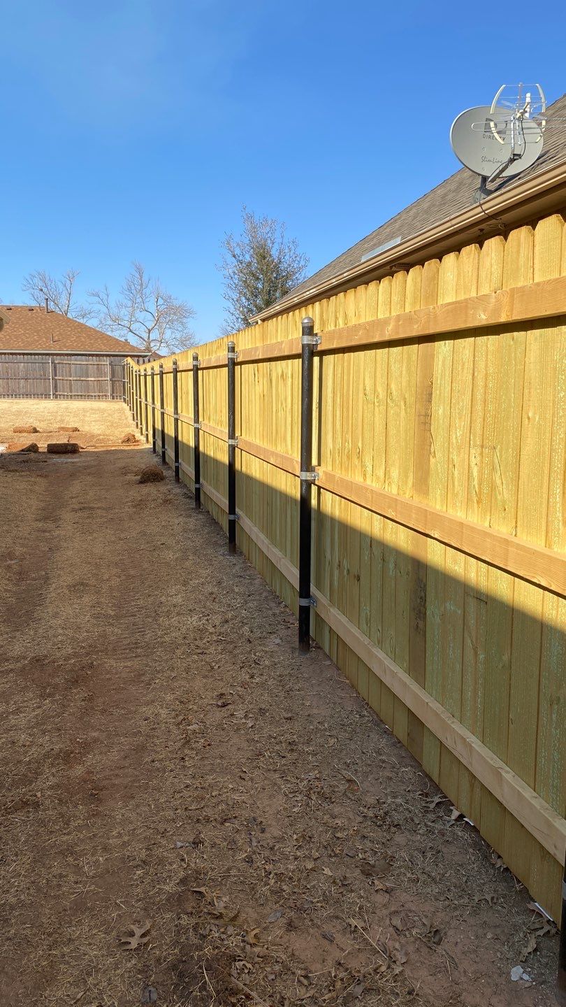 Concrete Slab , Retaining Wall , Fence, and landscape. by Clays Services Inc