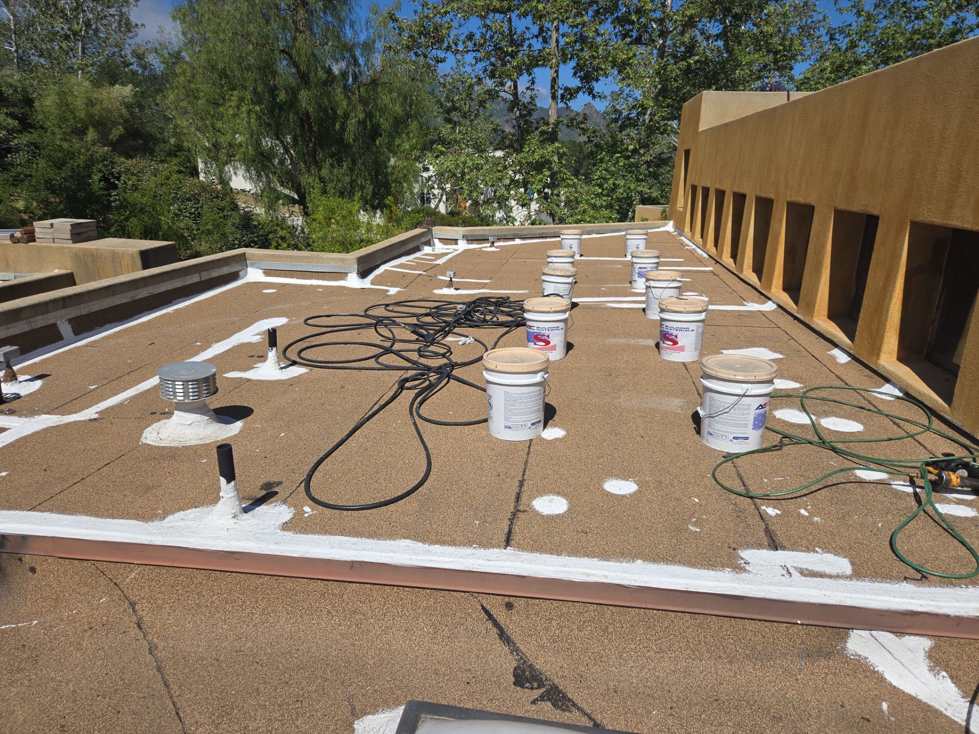 Tan Silicone Applied to a Stunning Residential Property in Calabasas by Hull Brothers Roofing