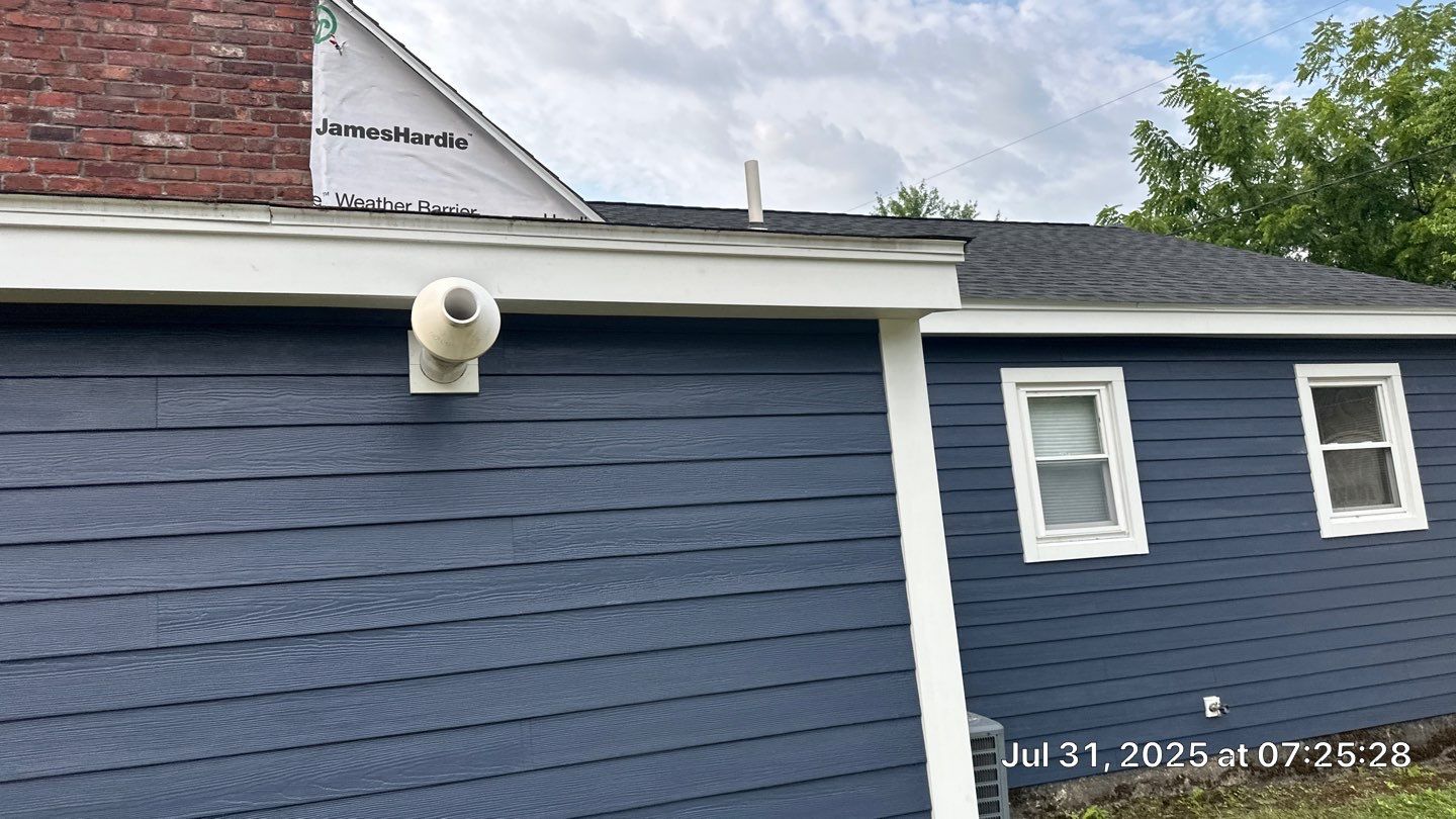 James Hardie Lap Siding Installation in Chelmsford, MA by Mighty Dog Roofing of Greater Middlesex County