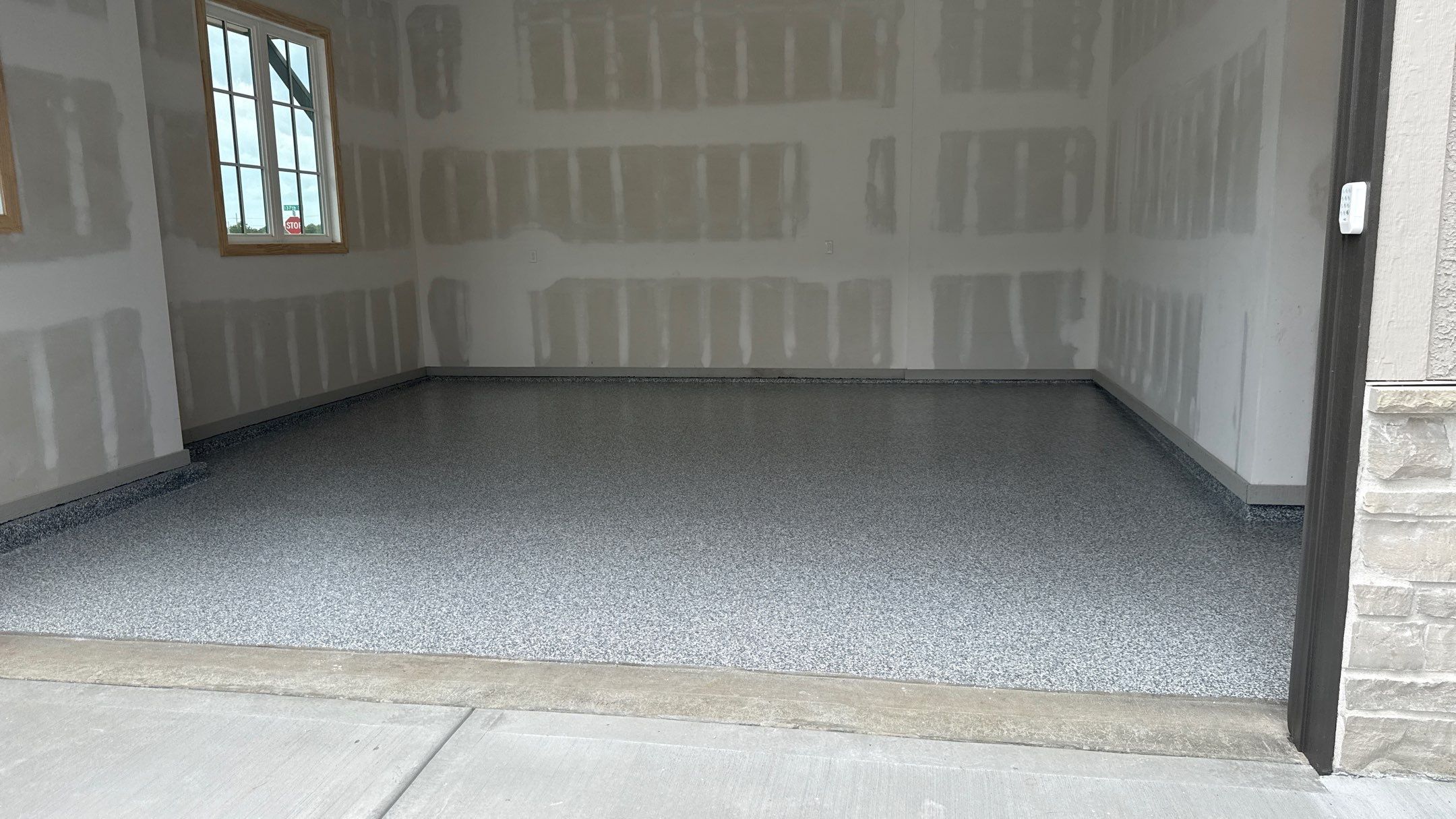 Make The Smart Choice and Get Your Floor Done Before Moving In  by Banner Garage