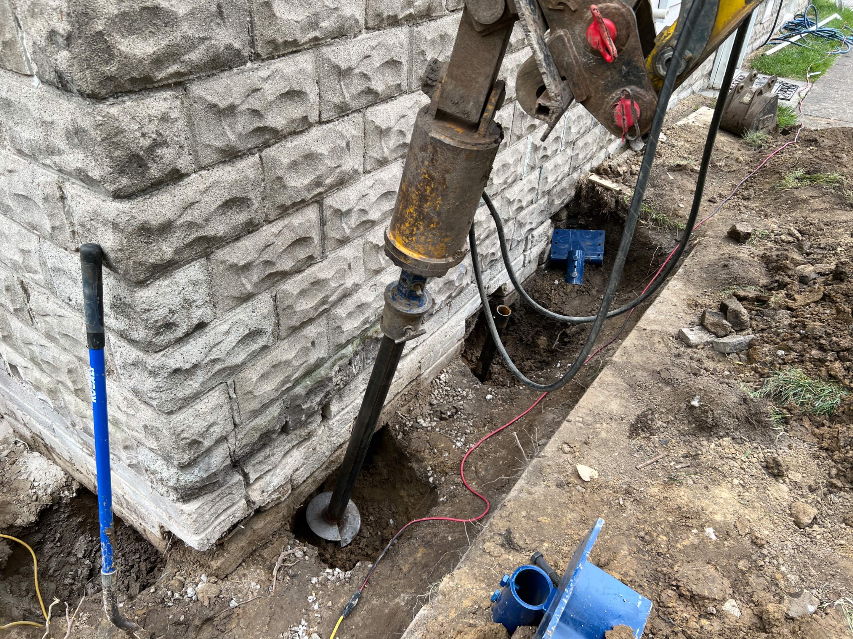 Helical Piers using Helical Deep Foundation Footings by Toledo Basement Repair
