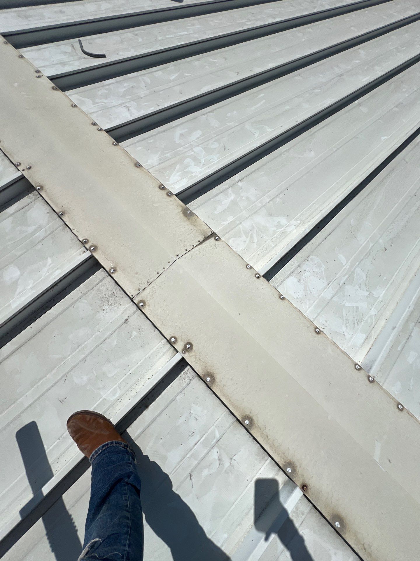 Commercial Roofing Repair using Metal by Roof Repair Company