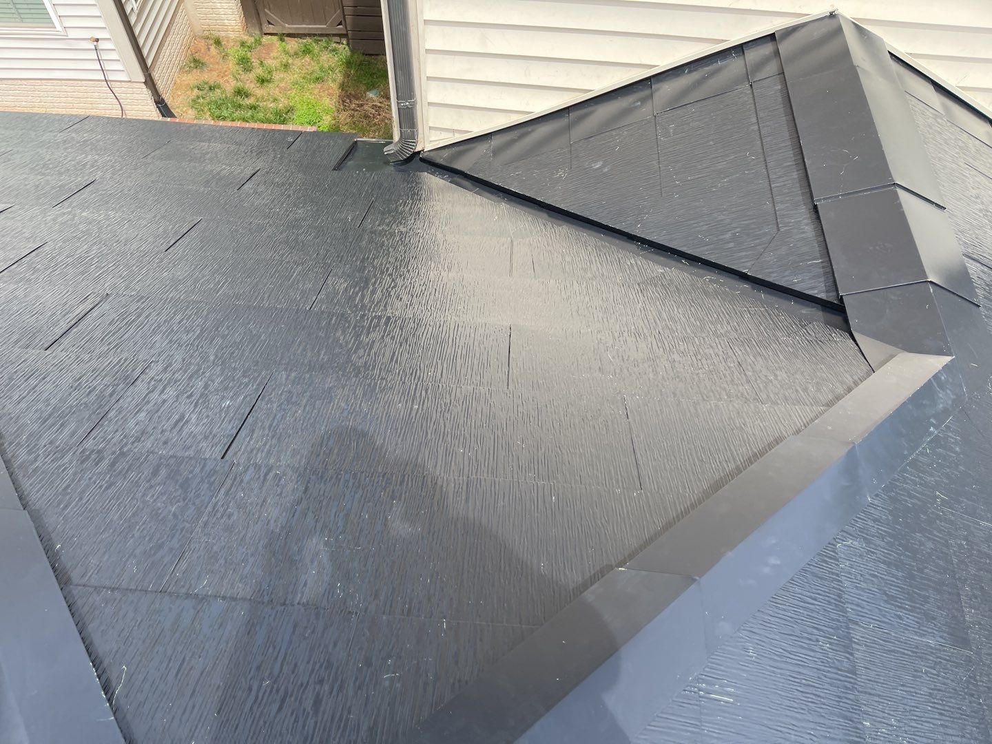 Tesla Solar Roof using Tesla Solar Roof V3 tiles by American Home Contractors