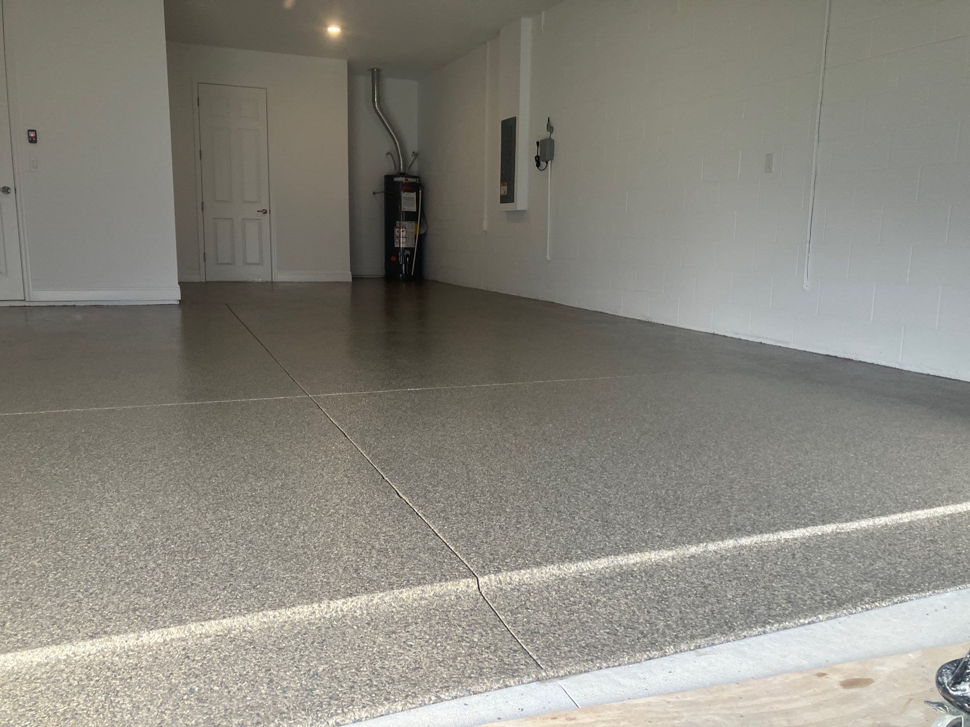 Garage Project in Trailmix by Cross Creek Concrete Coatings